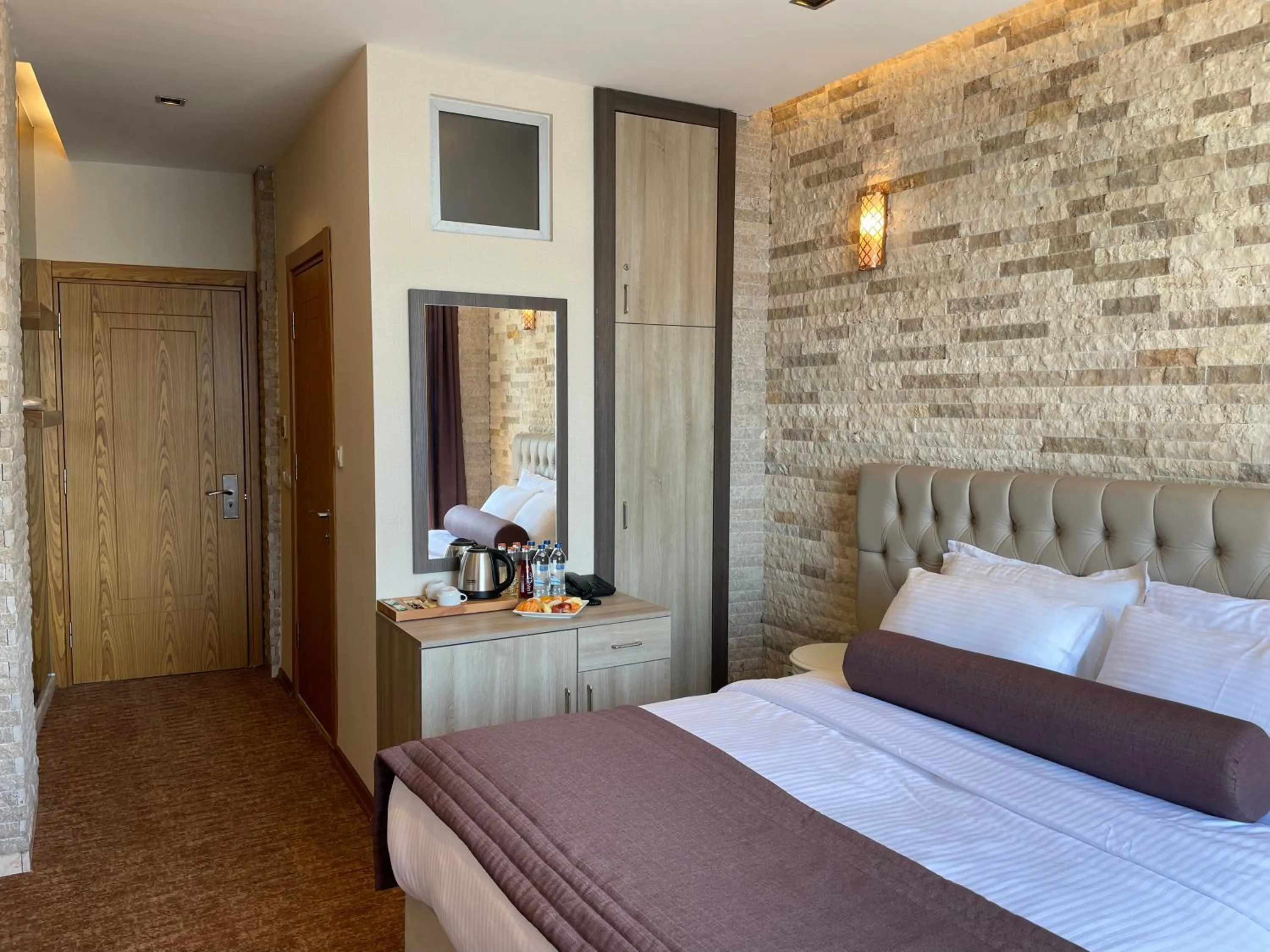 Bed in Mayfair Seaside Hotel