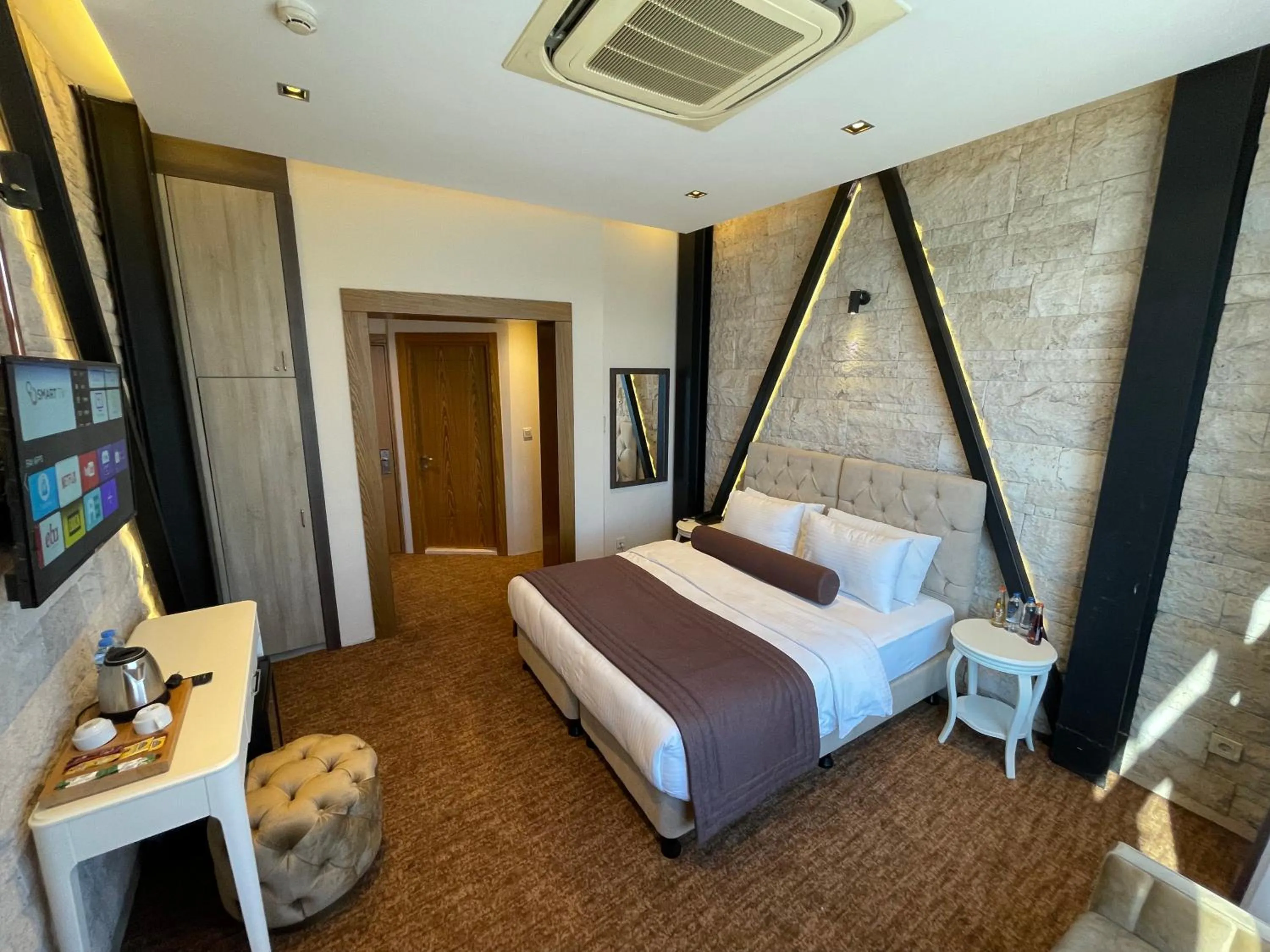 Bed in Mayfair Seaside Hotel