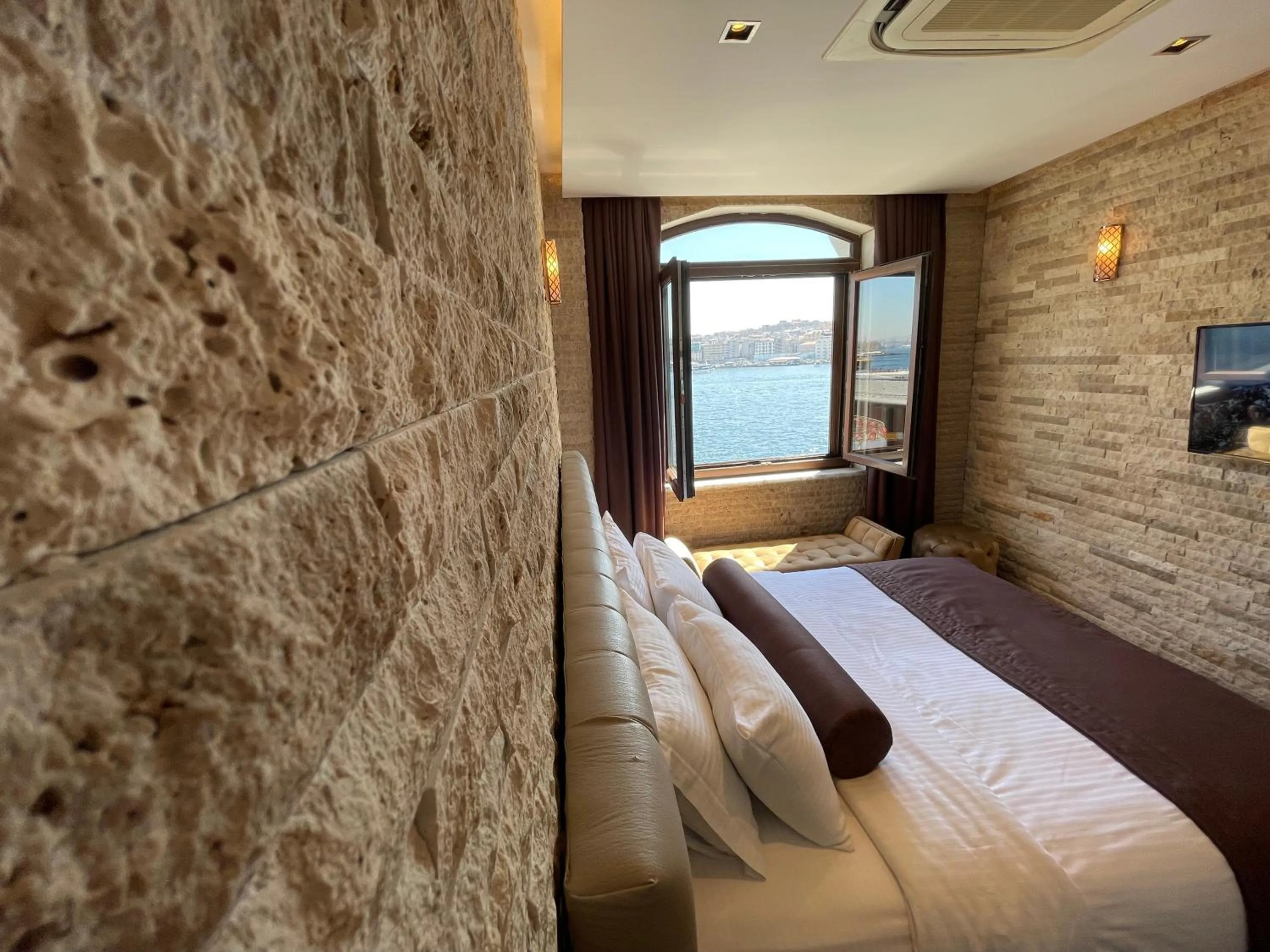 Bed in Mayfair Seaside Hotel