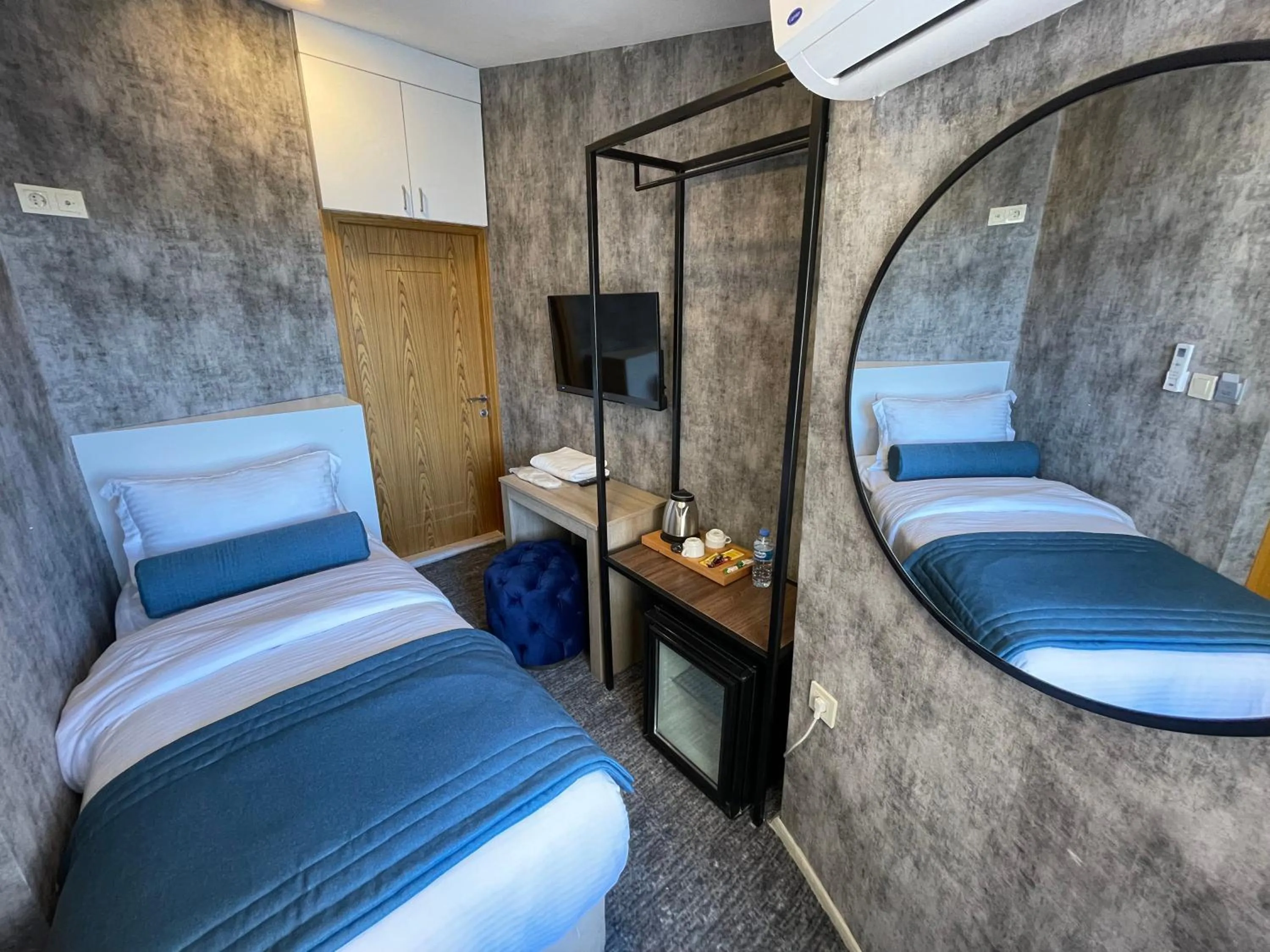 Bathroom, Bed in Mayfair Seaside Hotel