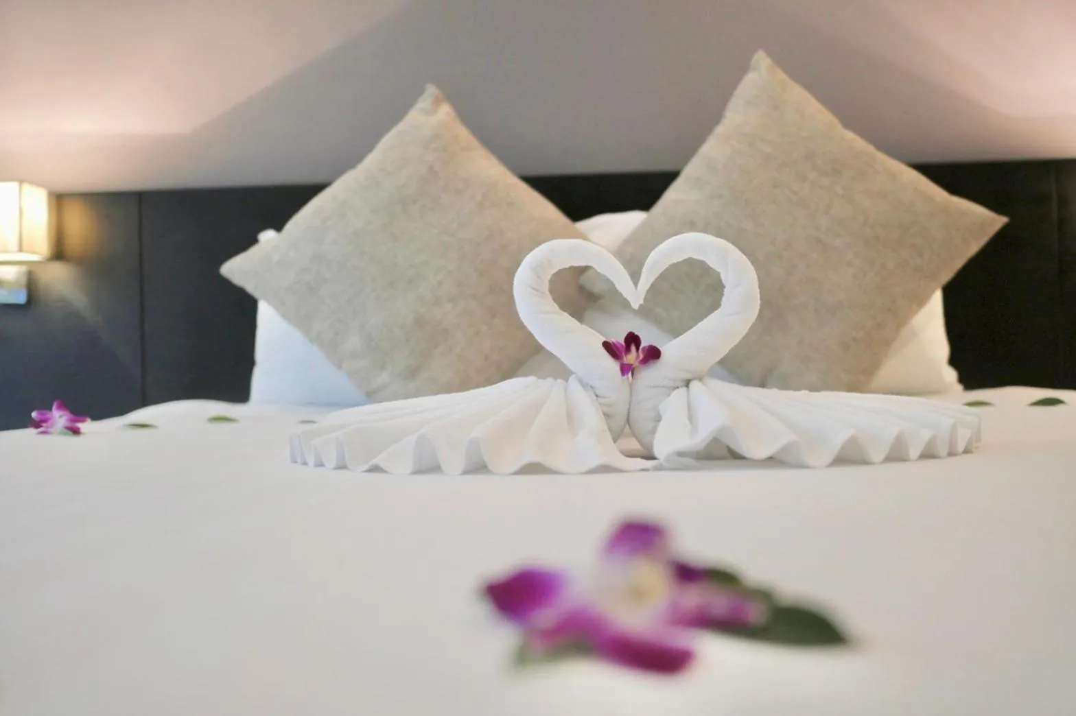 Bed in The Charm Resort Phuket