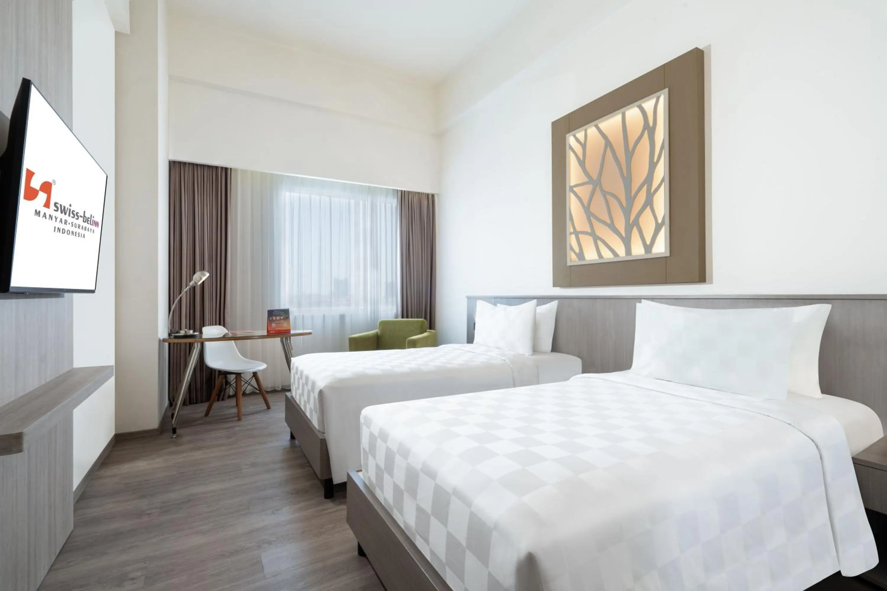 Bed in Swiss-Belinn Manyar