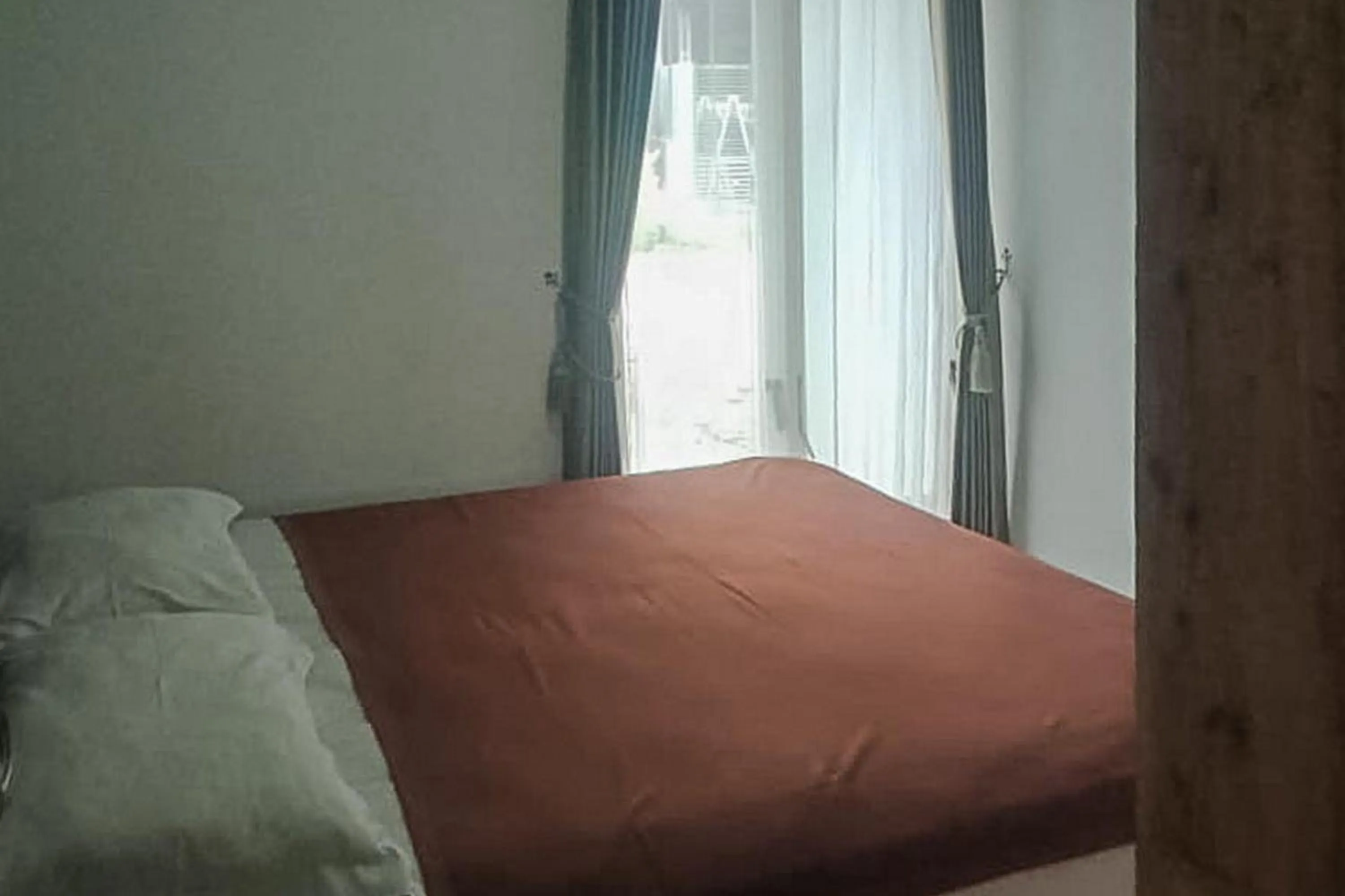 Bed in Syafa Homestay Syariah Mitra RedDoorz