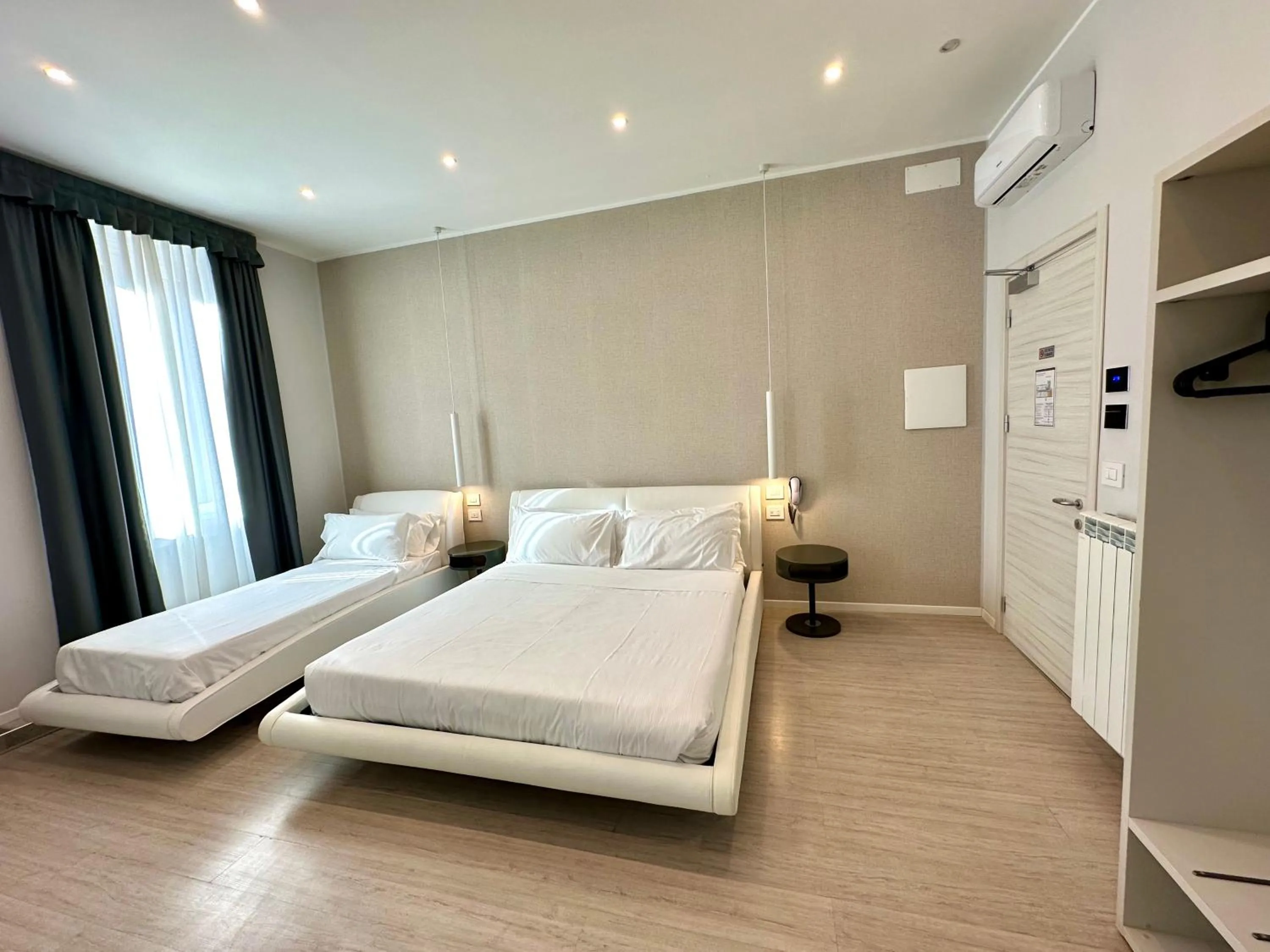 Bed in Cadorna Luxury Hotel