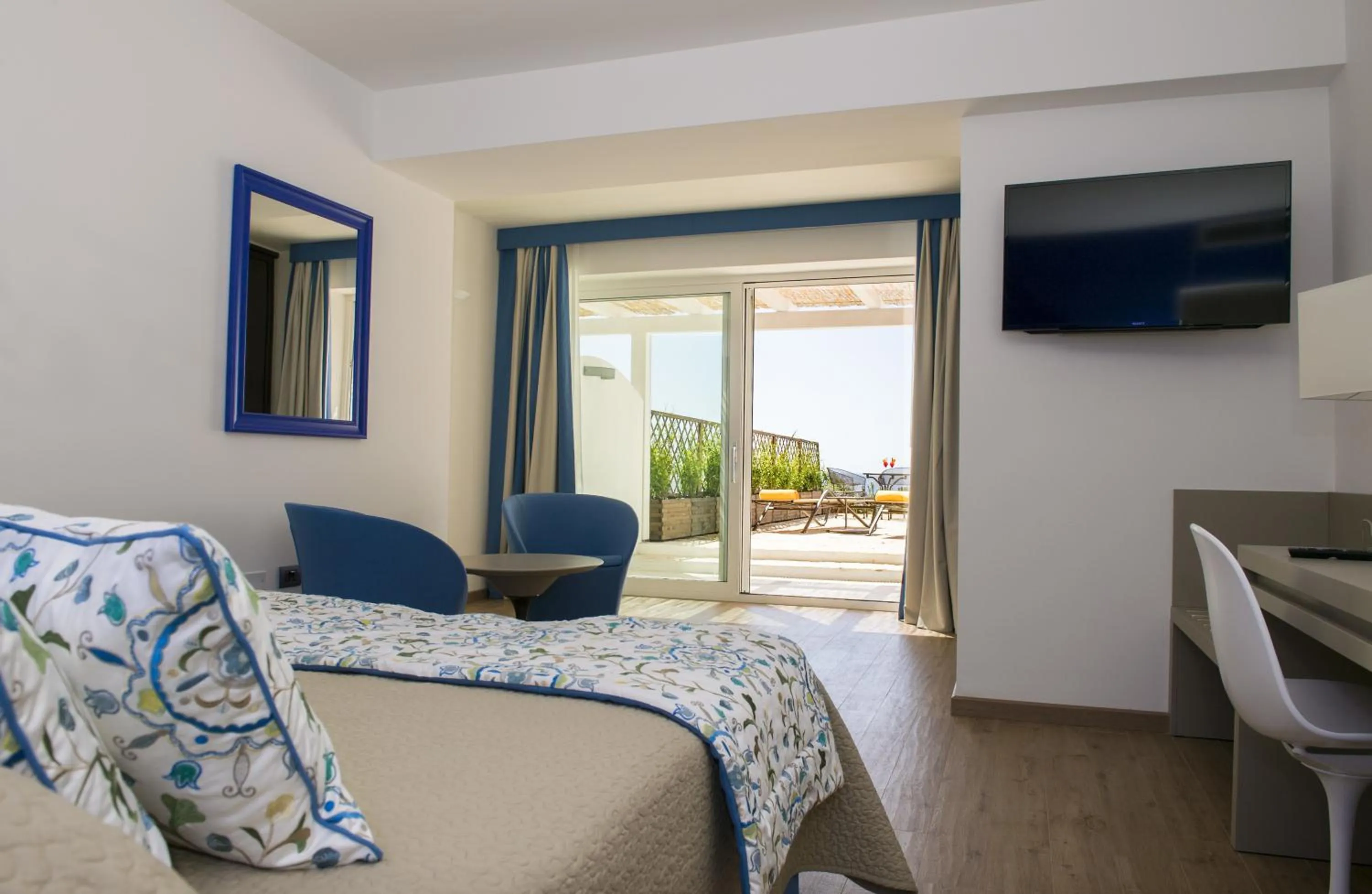 Photo of the whole room, Bed in El Faro Hotel & Spa