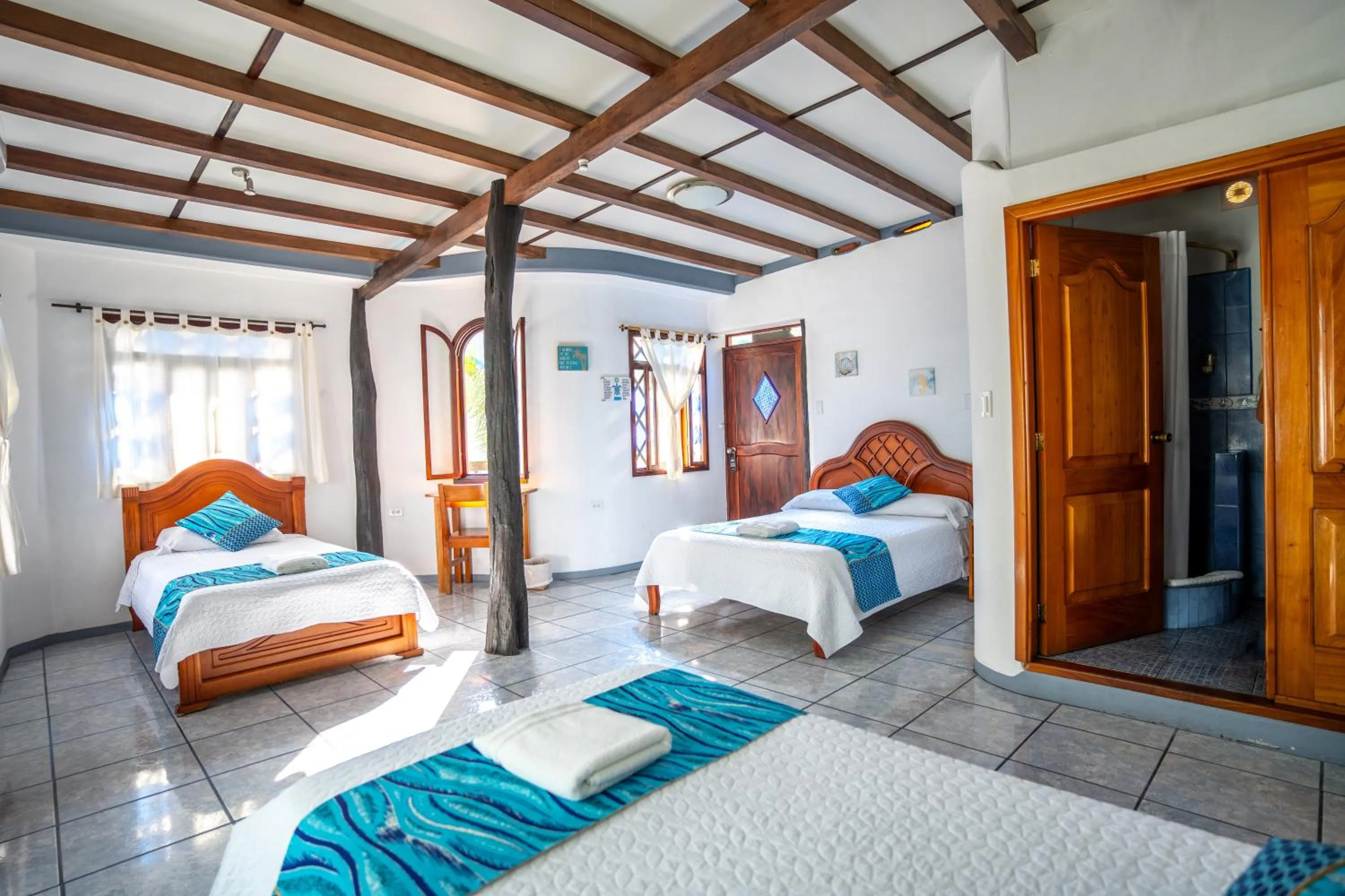 Bed in Maidith Galapagos Inn