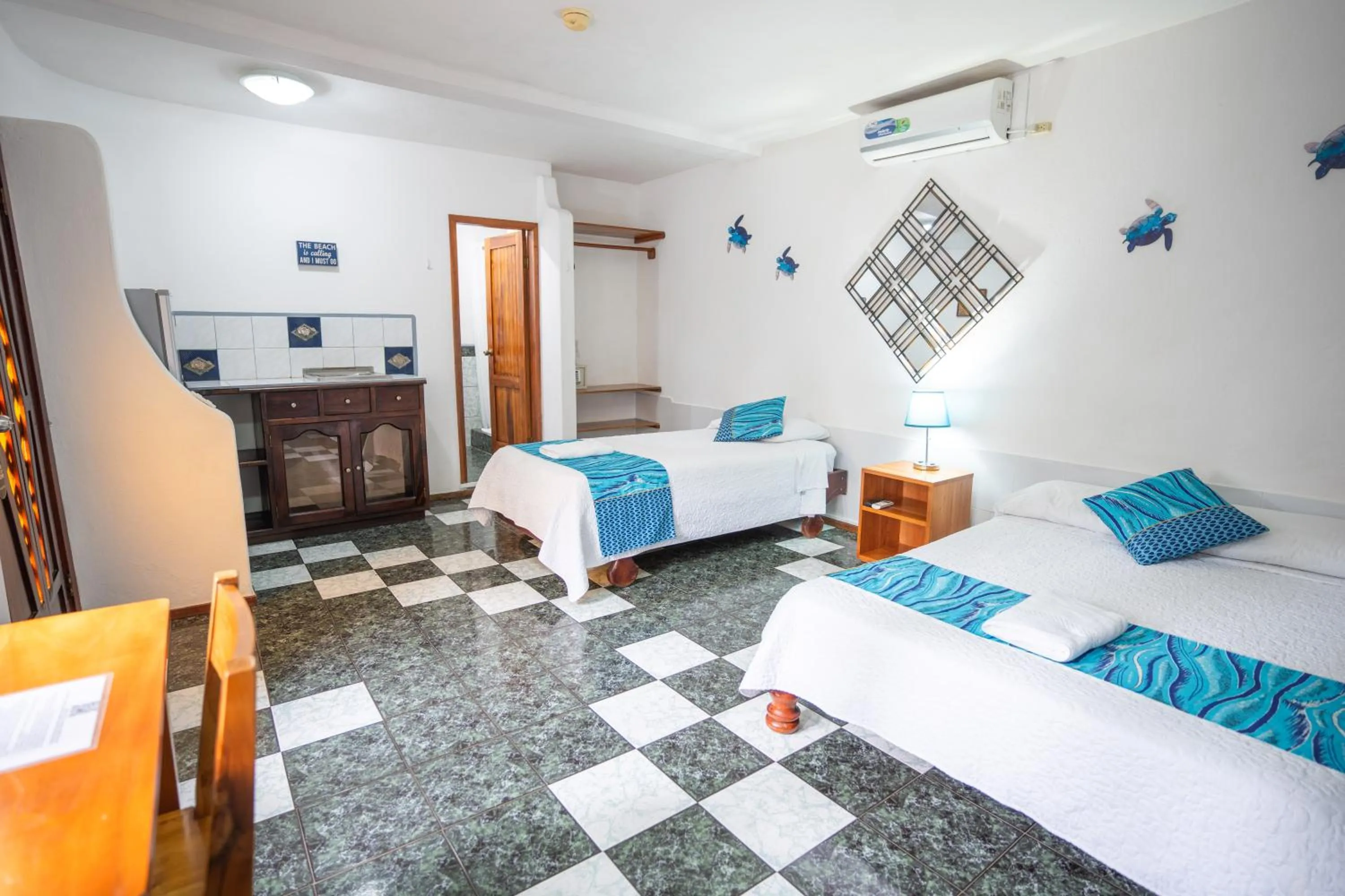 Bed in Maidith Galapagos Inn