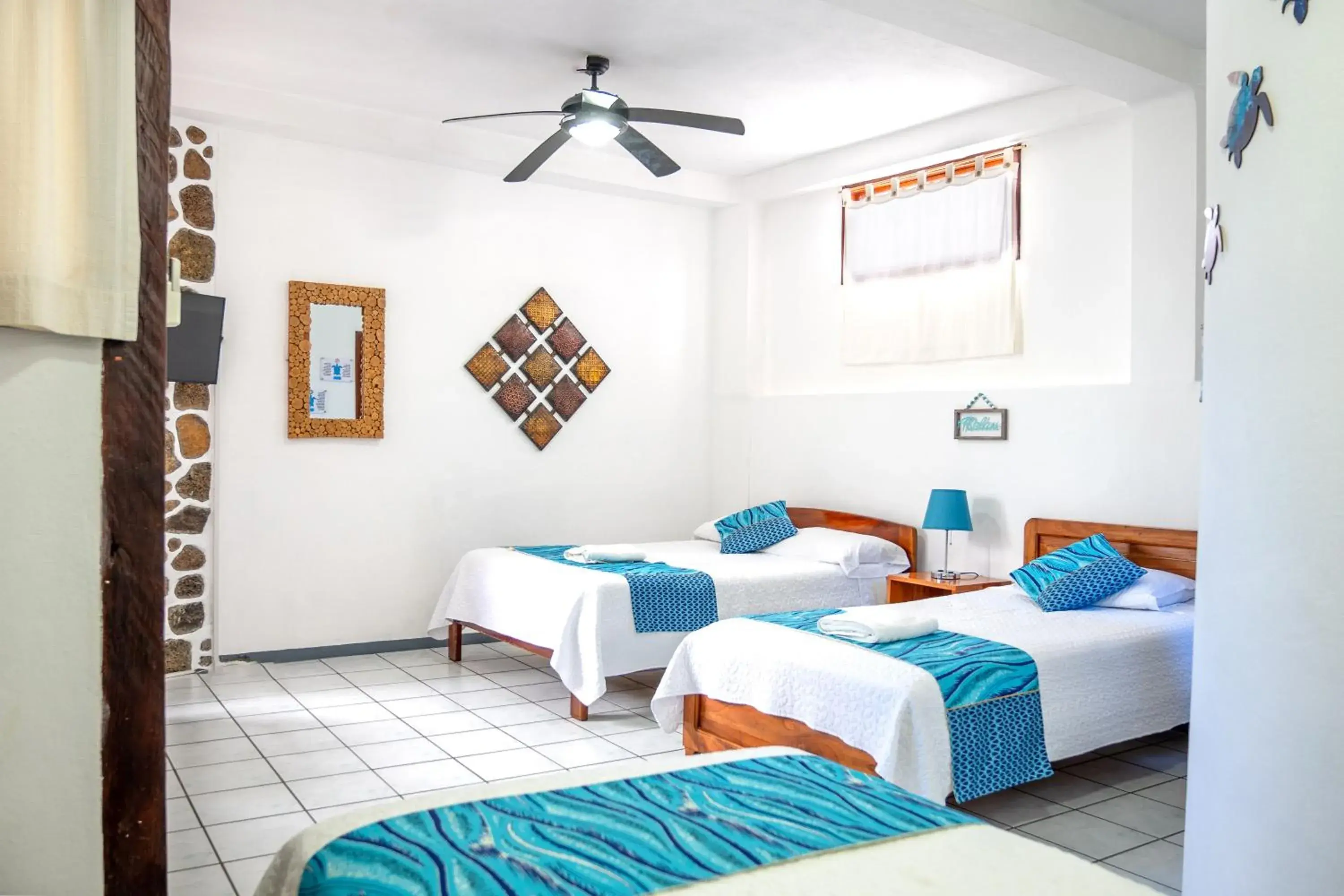 Fragata / Triple Room with Balcony in Maidith Galapagos Inn Fragata / Triple Room with Balcony in Maidith Galapagos Inn