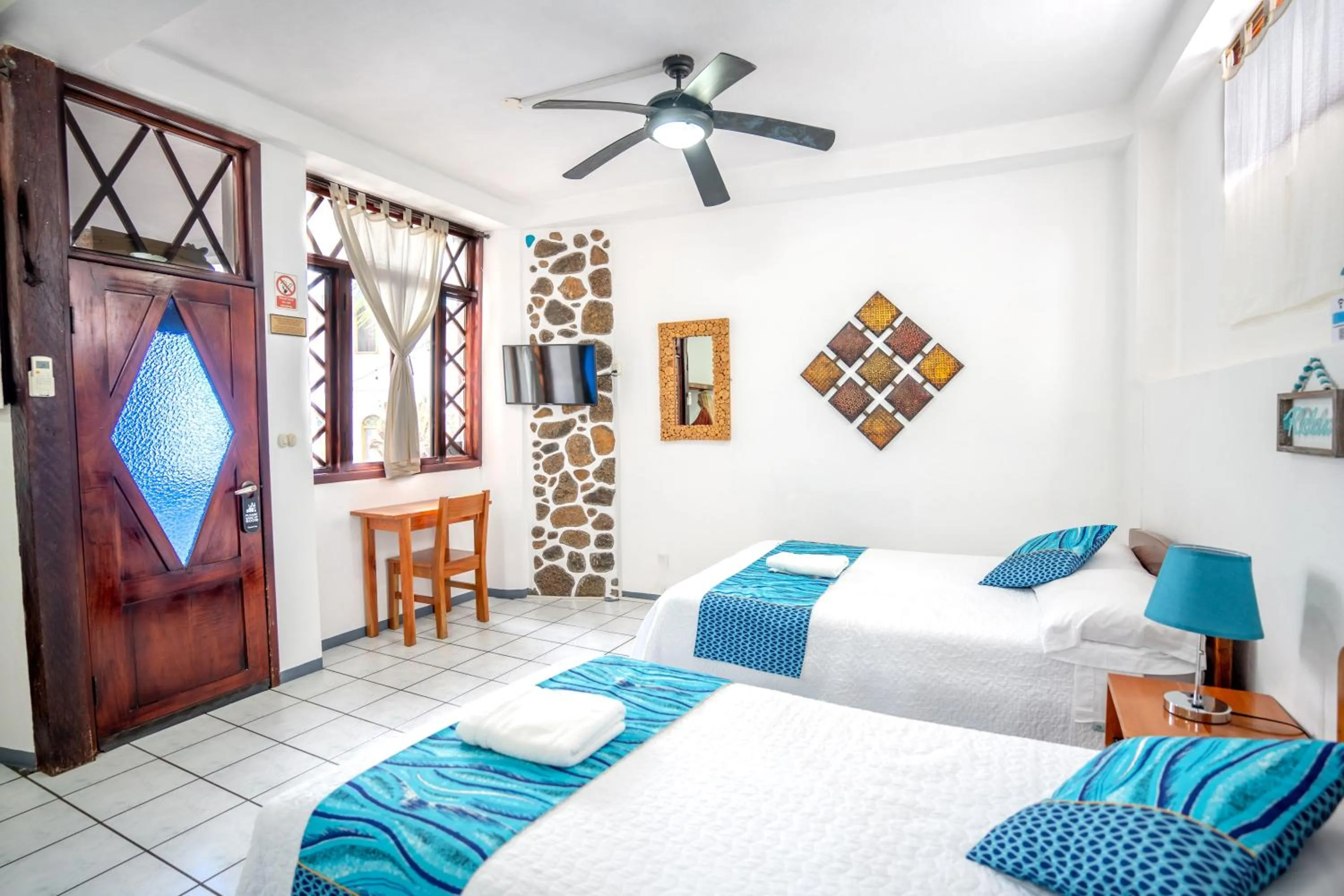 Bed in Maidith Galapagos Inn