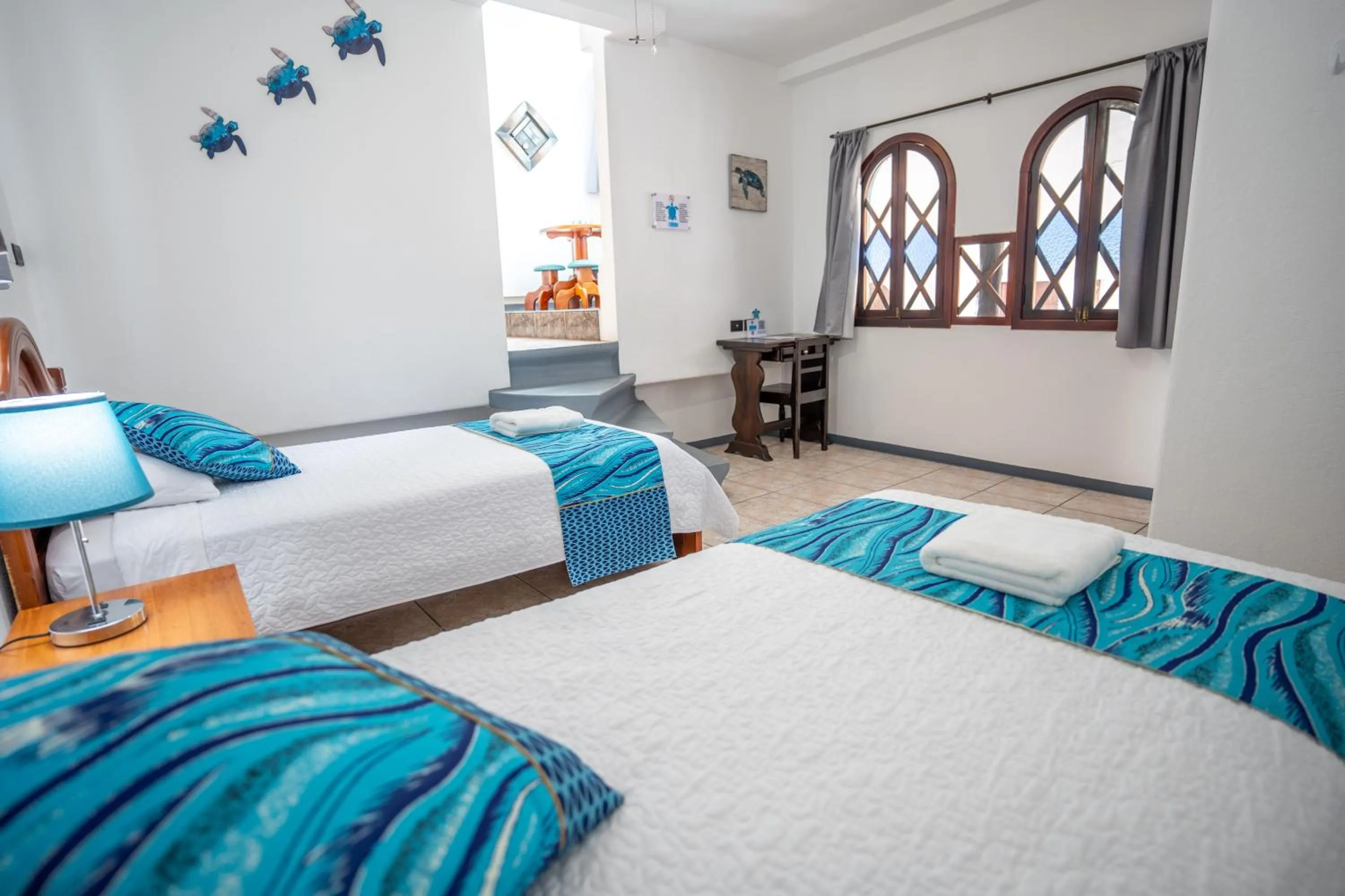 Bed in Maidith Galapagos Inn