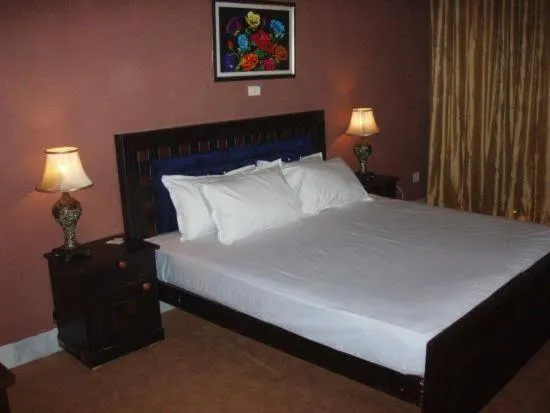 Bed in Gulshan Family Couple Guest House Hotel Gulshan-e-iqbal