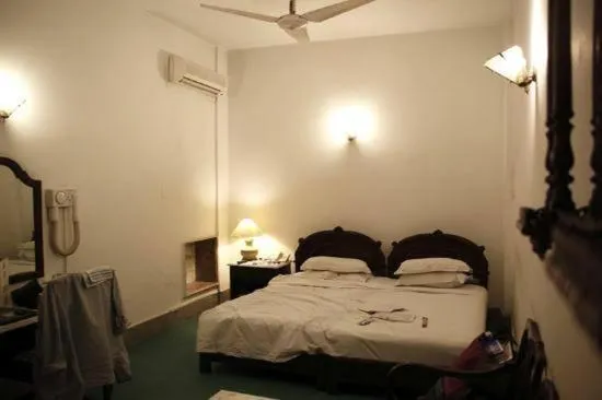 Bed in Gulshan Family Couple Guest House Hotel Gulshan-e-iqbal