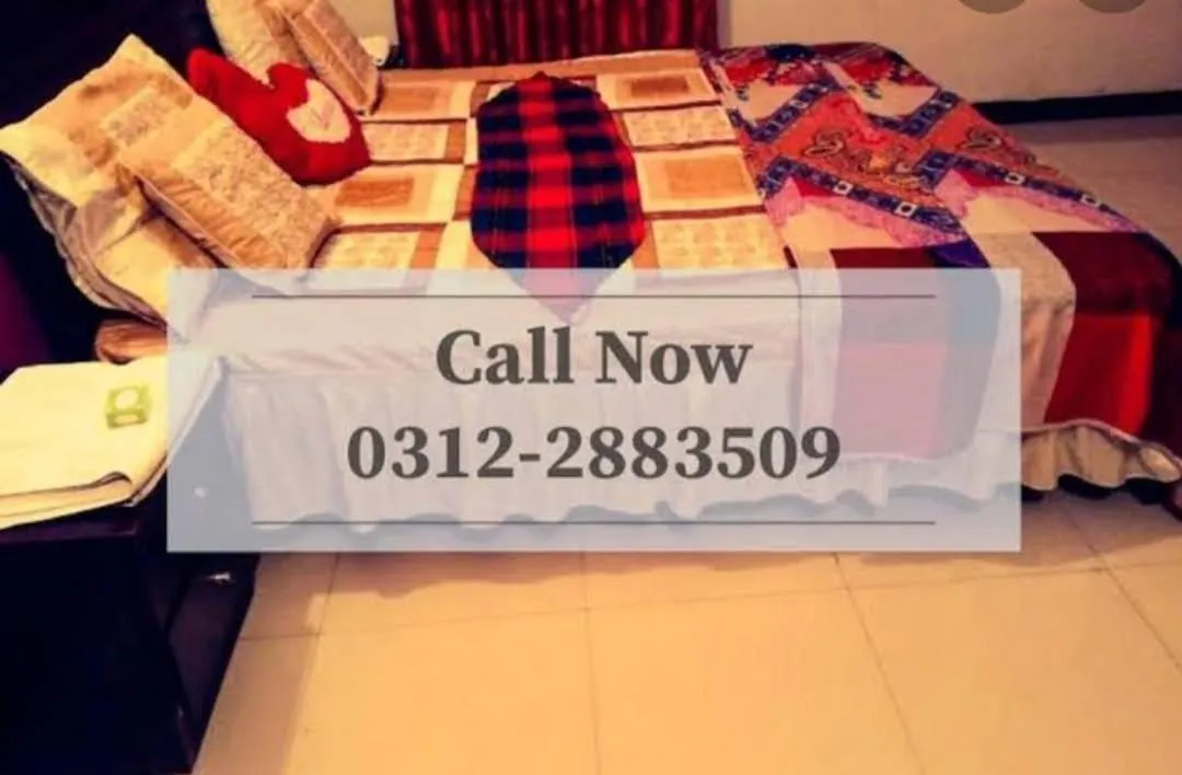 Bed in Gulshan Family Couple Guest House Hotel Gulshan-e-iqbal