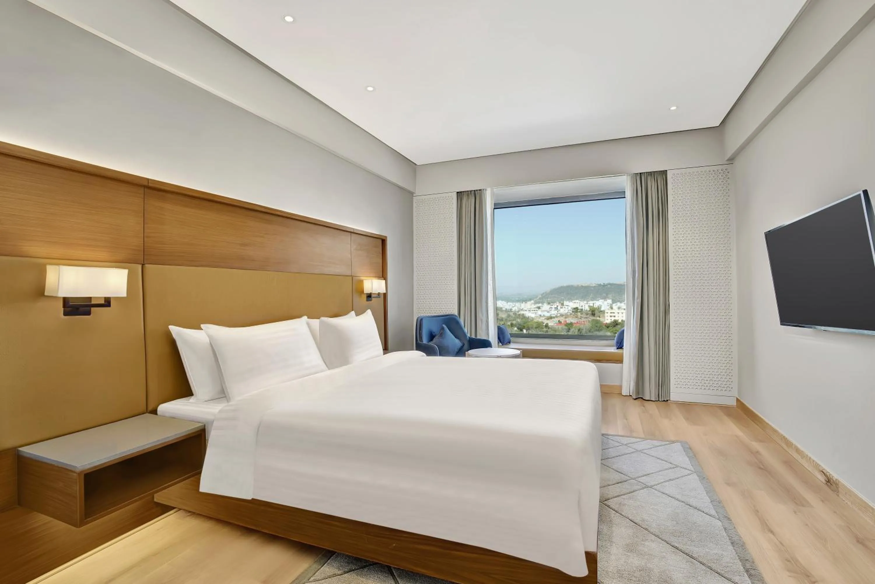 View (from property/room), Bed in Radisson Hotel Nathdwara