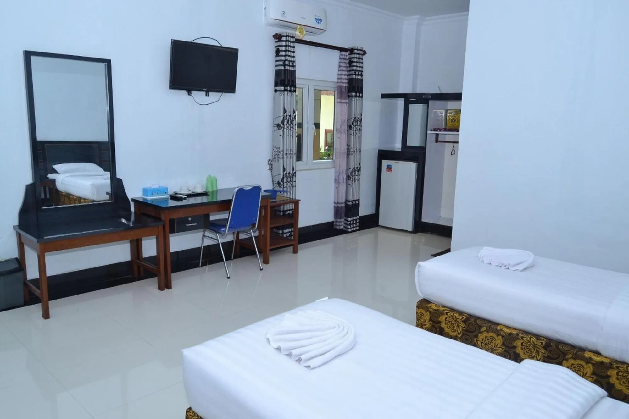 Bed in Malibou Hotel Medan