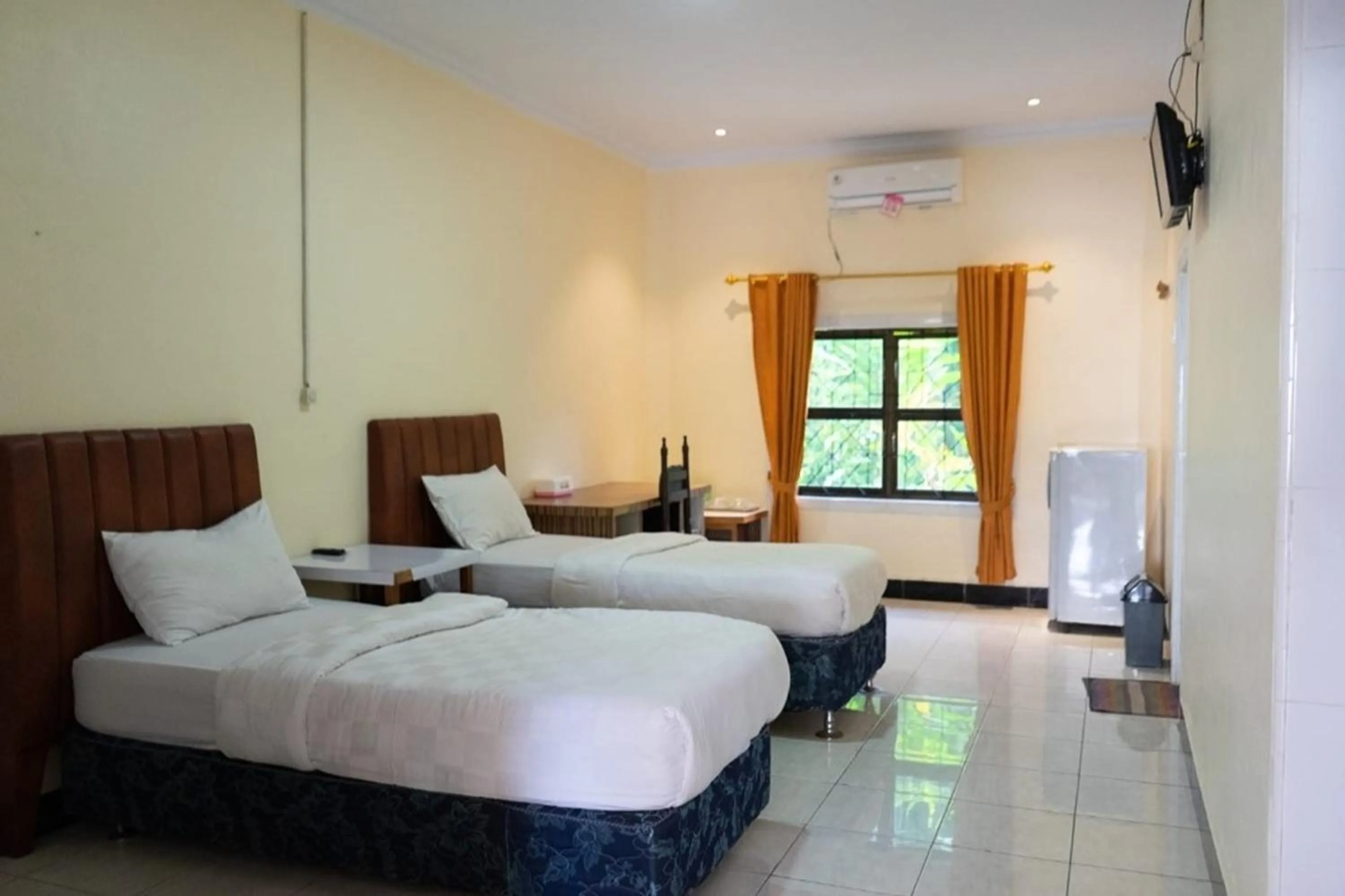 Bed in Malibou Hotel Medan