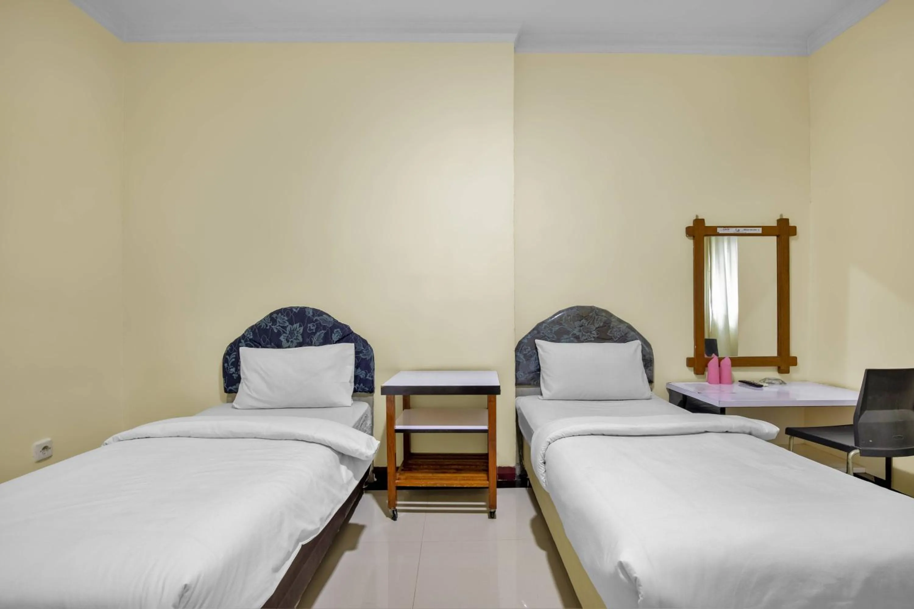 Bed in Malibou Hotel Medan