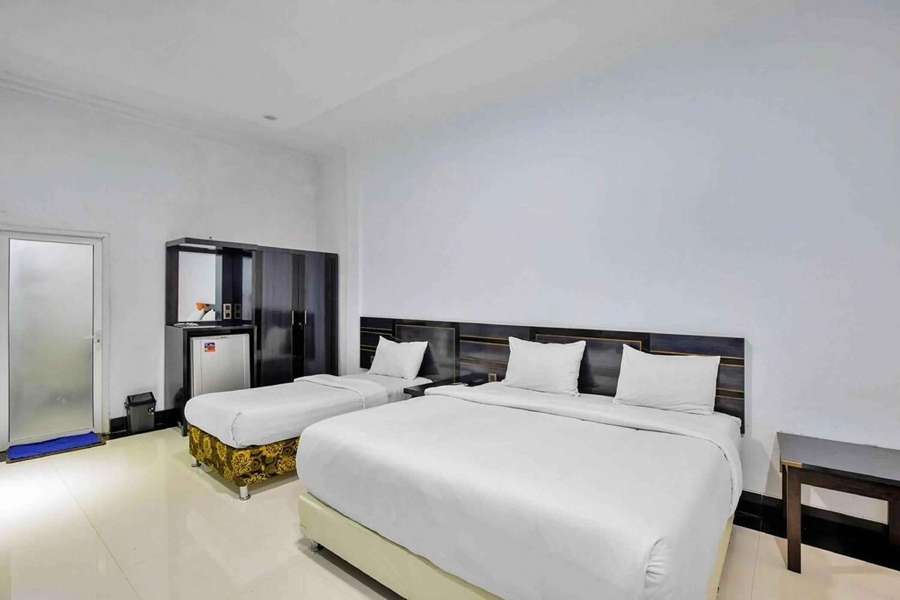 Bed in Malibou Hotel Medan