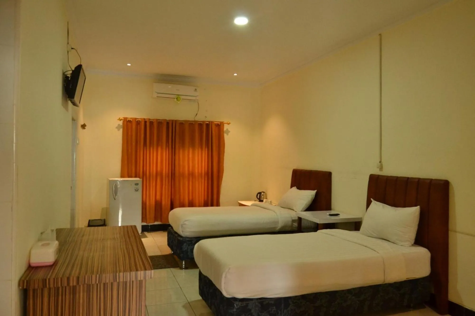 Bed in Malibou Hotel Medan