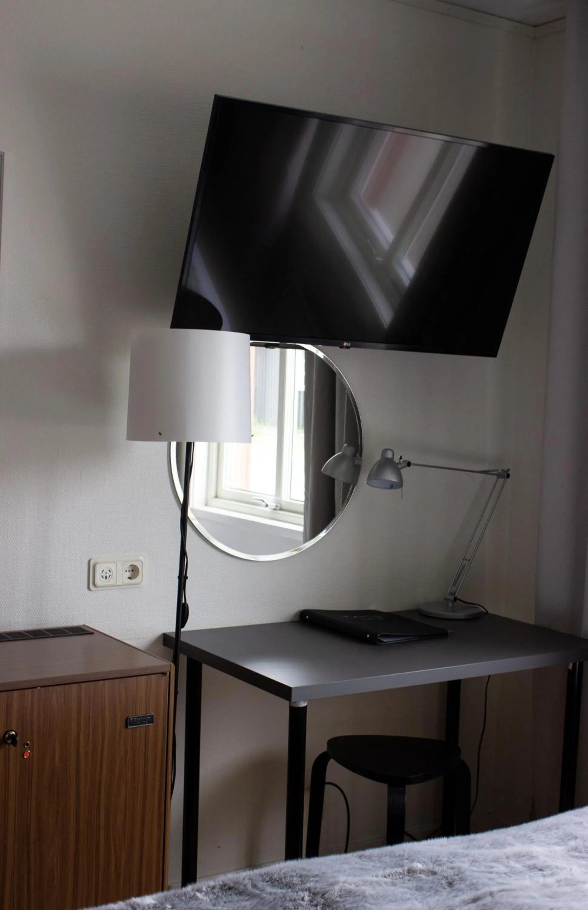 Seating area, Bed in Hotell Tjamstan Malå