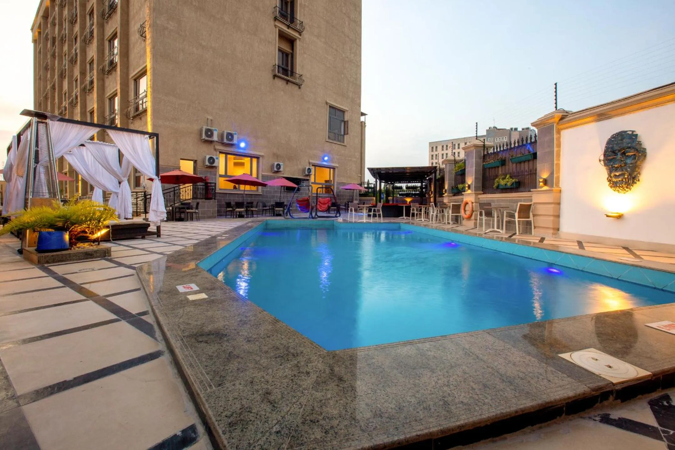 Swimming pool in JOHNWOOD HOTEL by Bolton