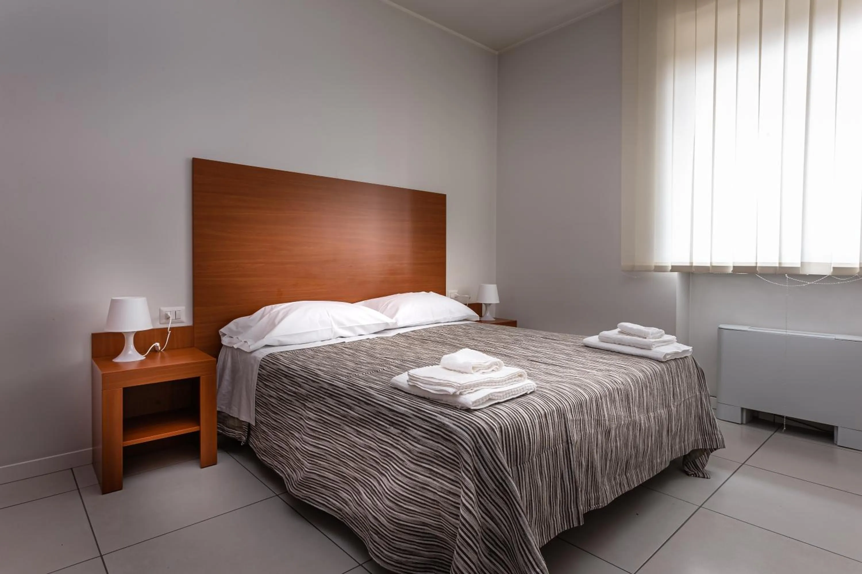 Bed in Pasta Residence Italia Malpensa