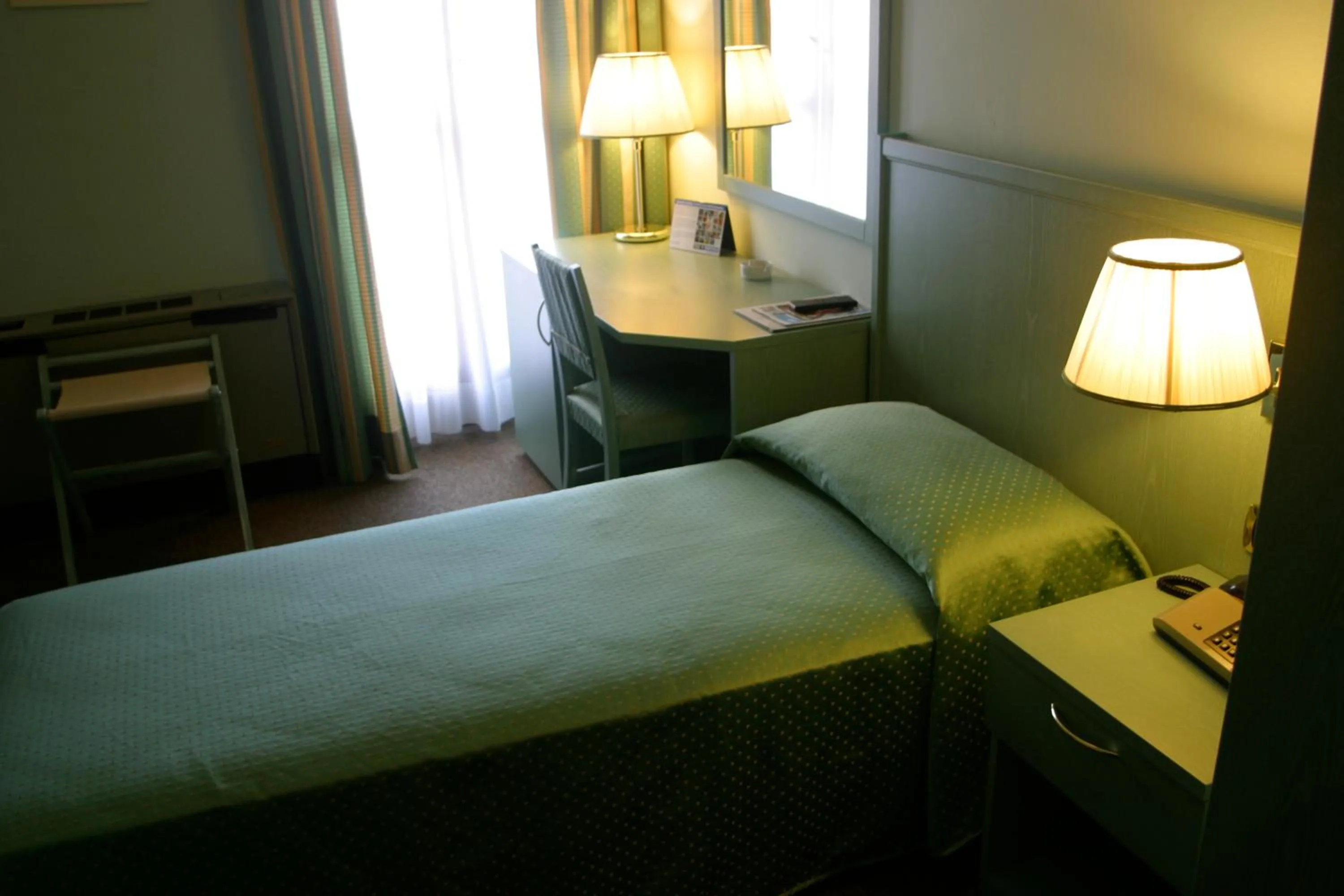 Bed in Albergo Della Corona