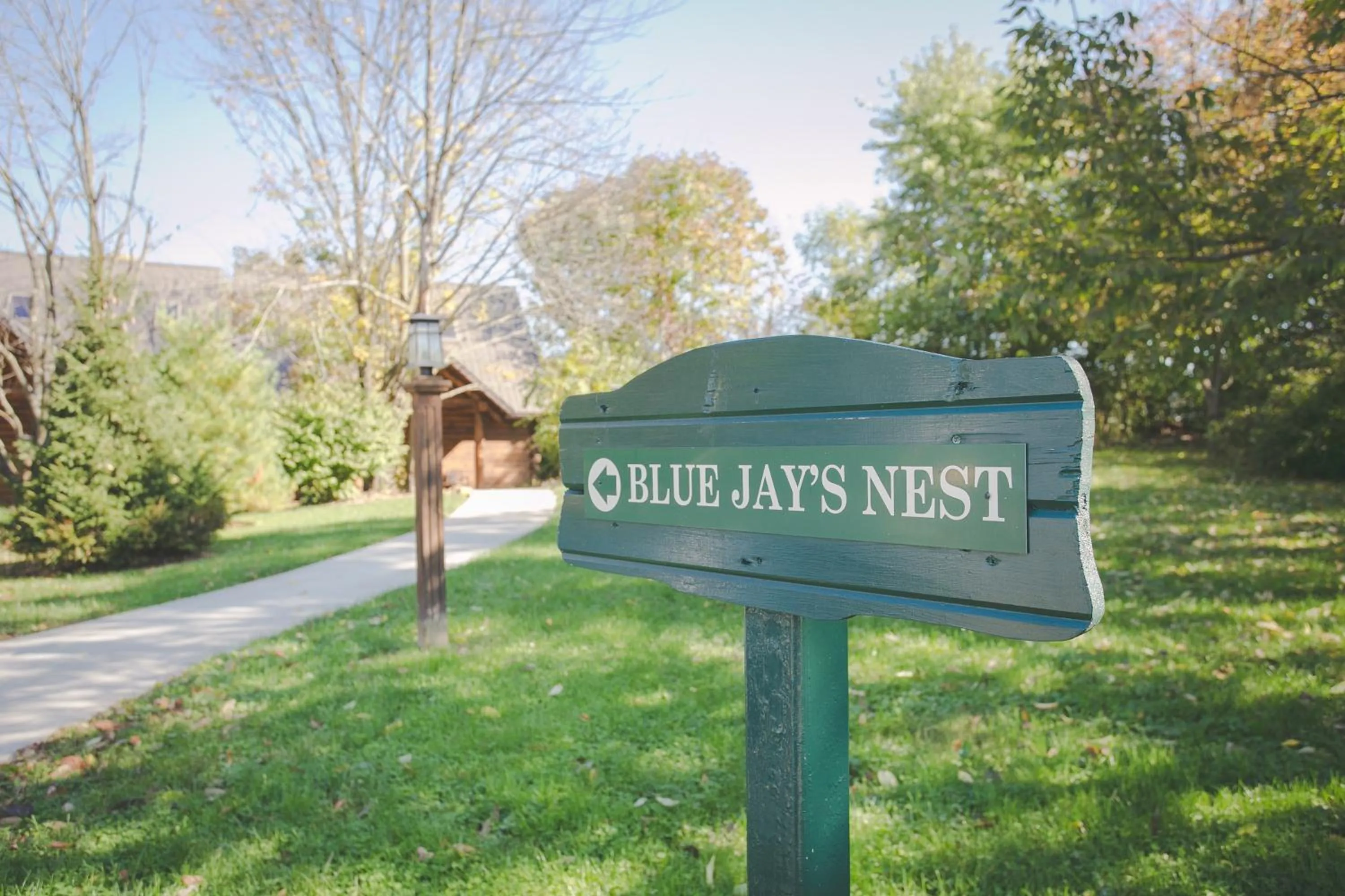 Property logo or sign in Blue Jays Nest Cabin by Amish Country Lodging