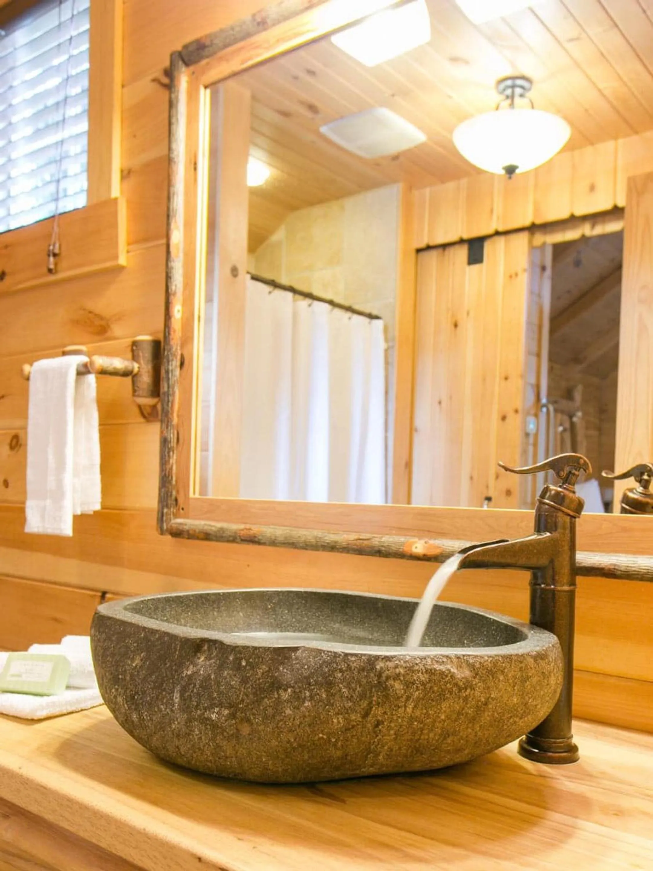 Bathroom in Lofty Willows Treehouse by Amish Country Lodging