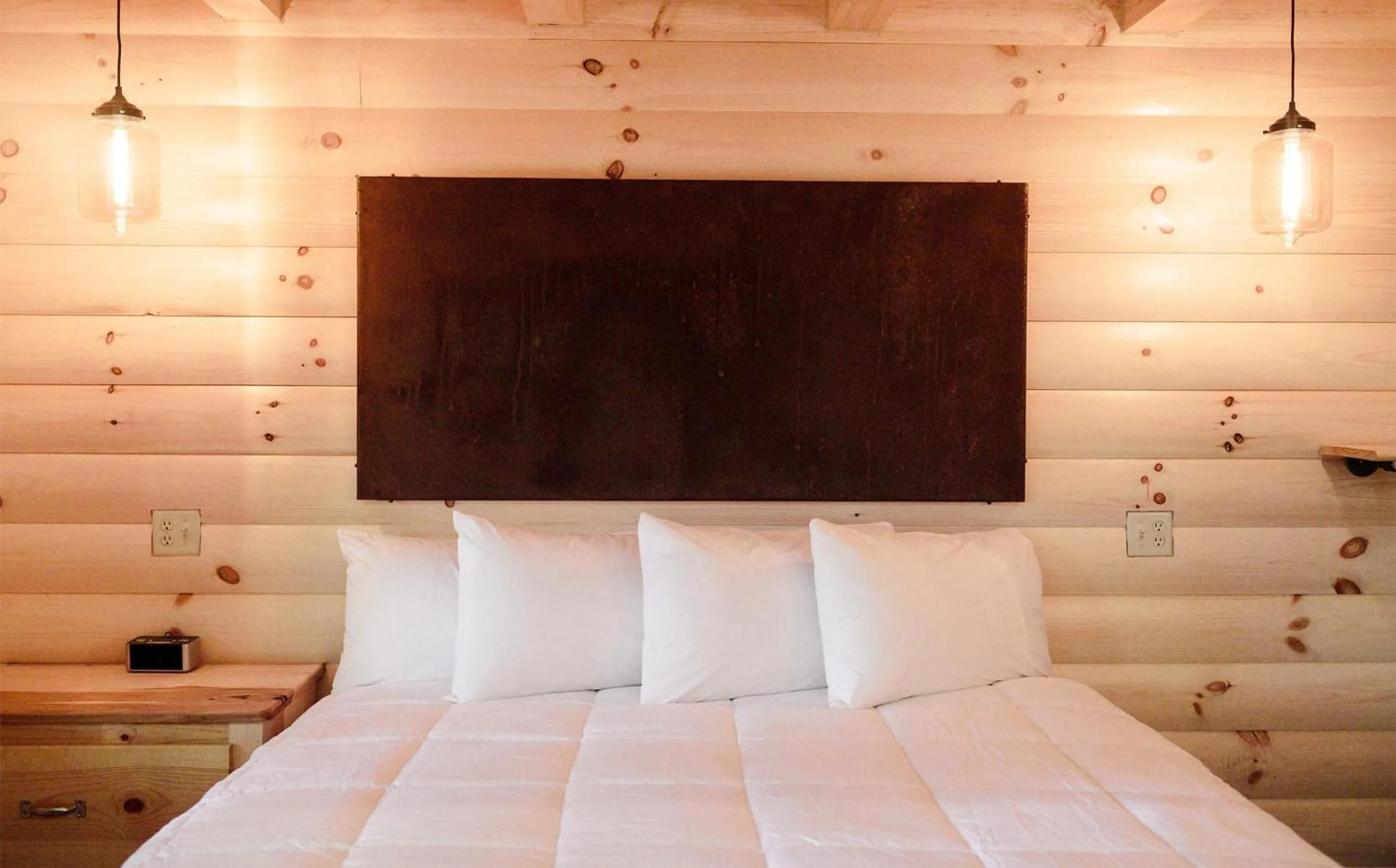 Bed in Treehouse #1 by Amish Country Lodging