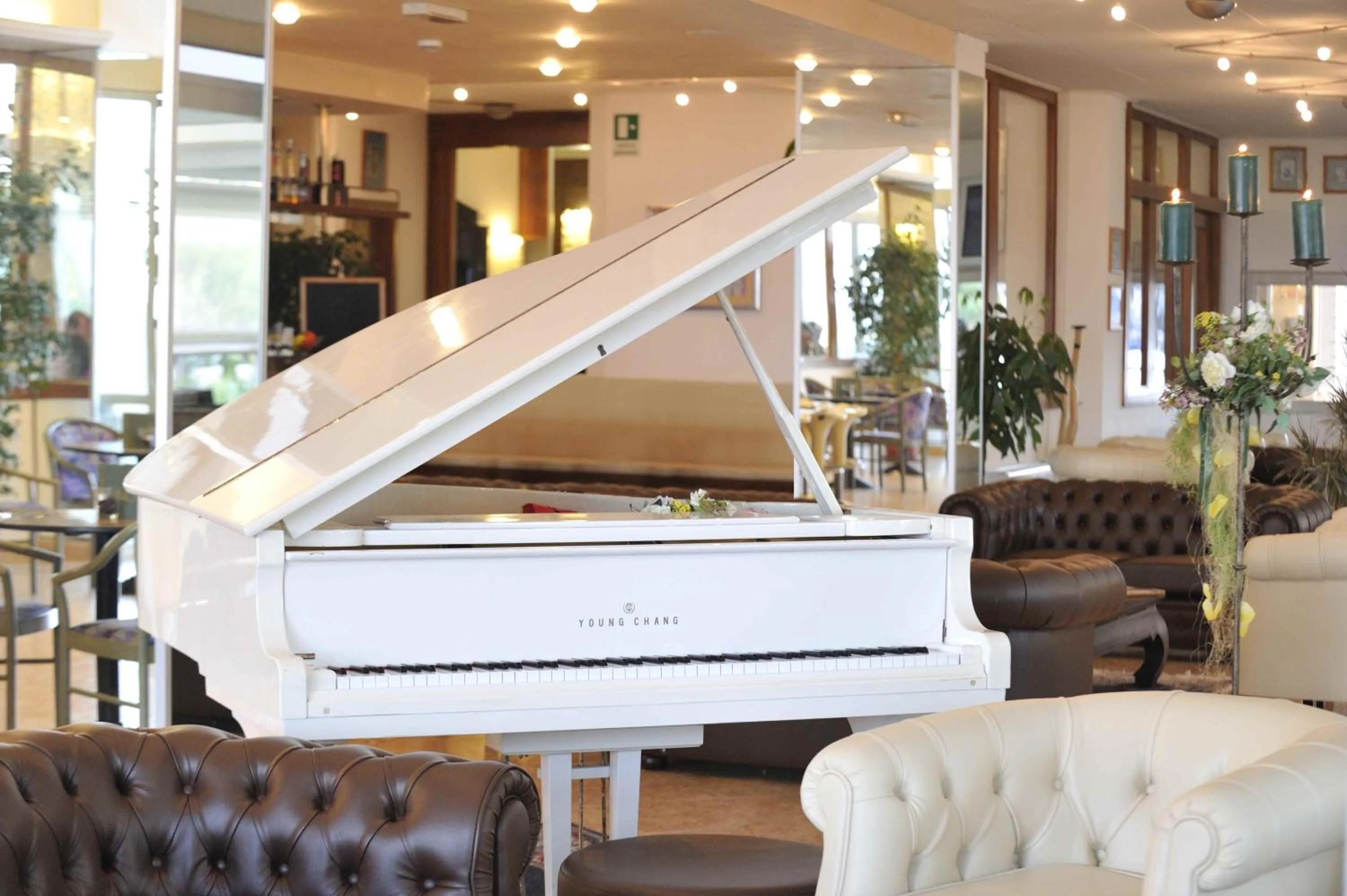 Communal lounge/ TV room in Hotel Excelsior