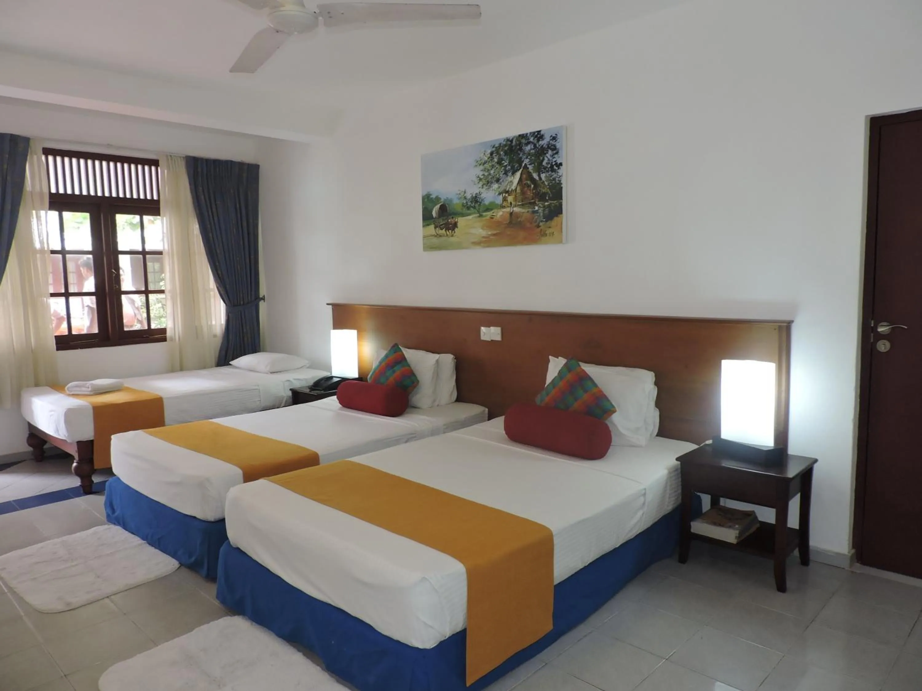 Bed in Catamaran Beach Hotel