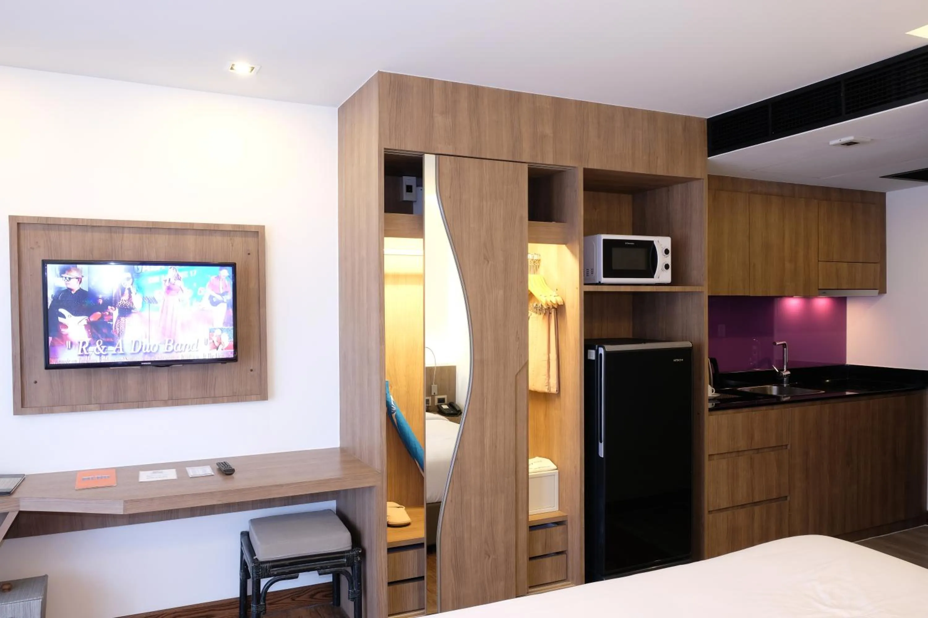 Kitchen or kitchenette, Bed in The Beach Heights Resort SHA Plus
