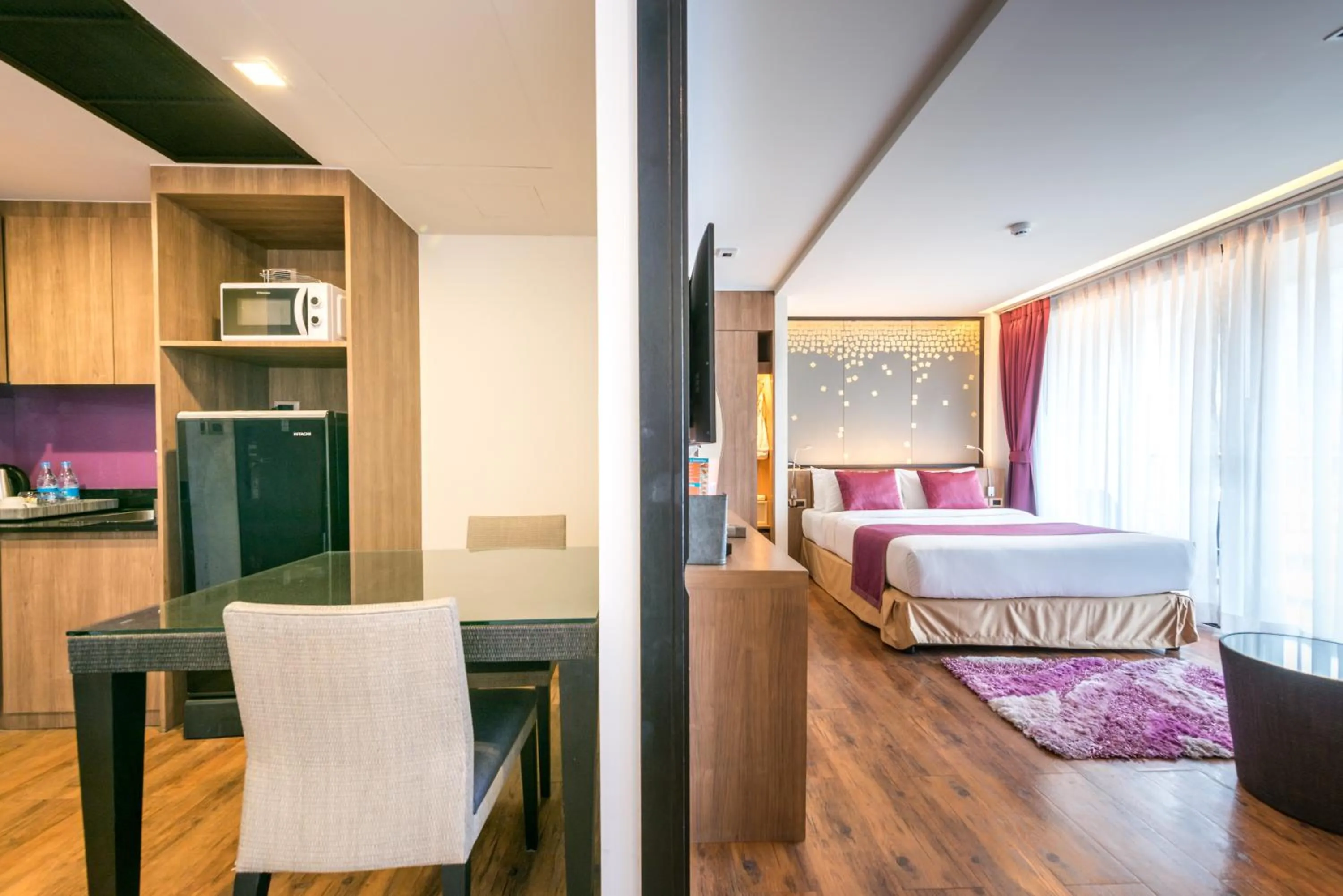 Kitchen or kitchenette, Bed in The Beach Heights Resort SHA Plus