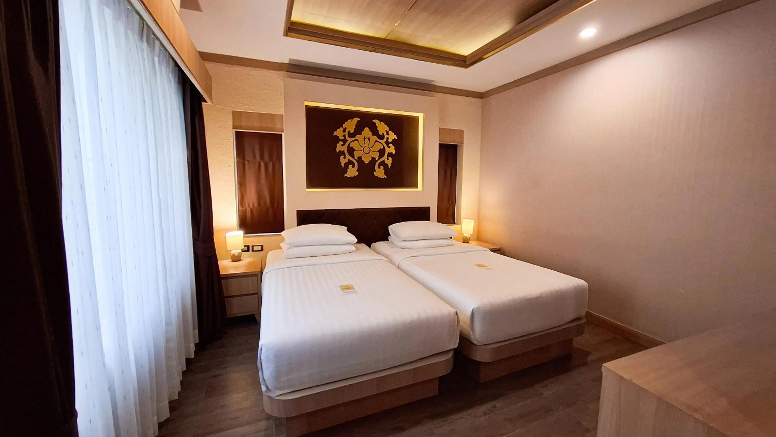 Bed in Quality Beach Resorts and Spa Patong