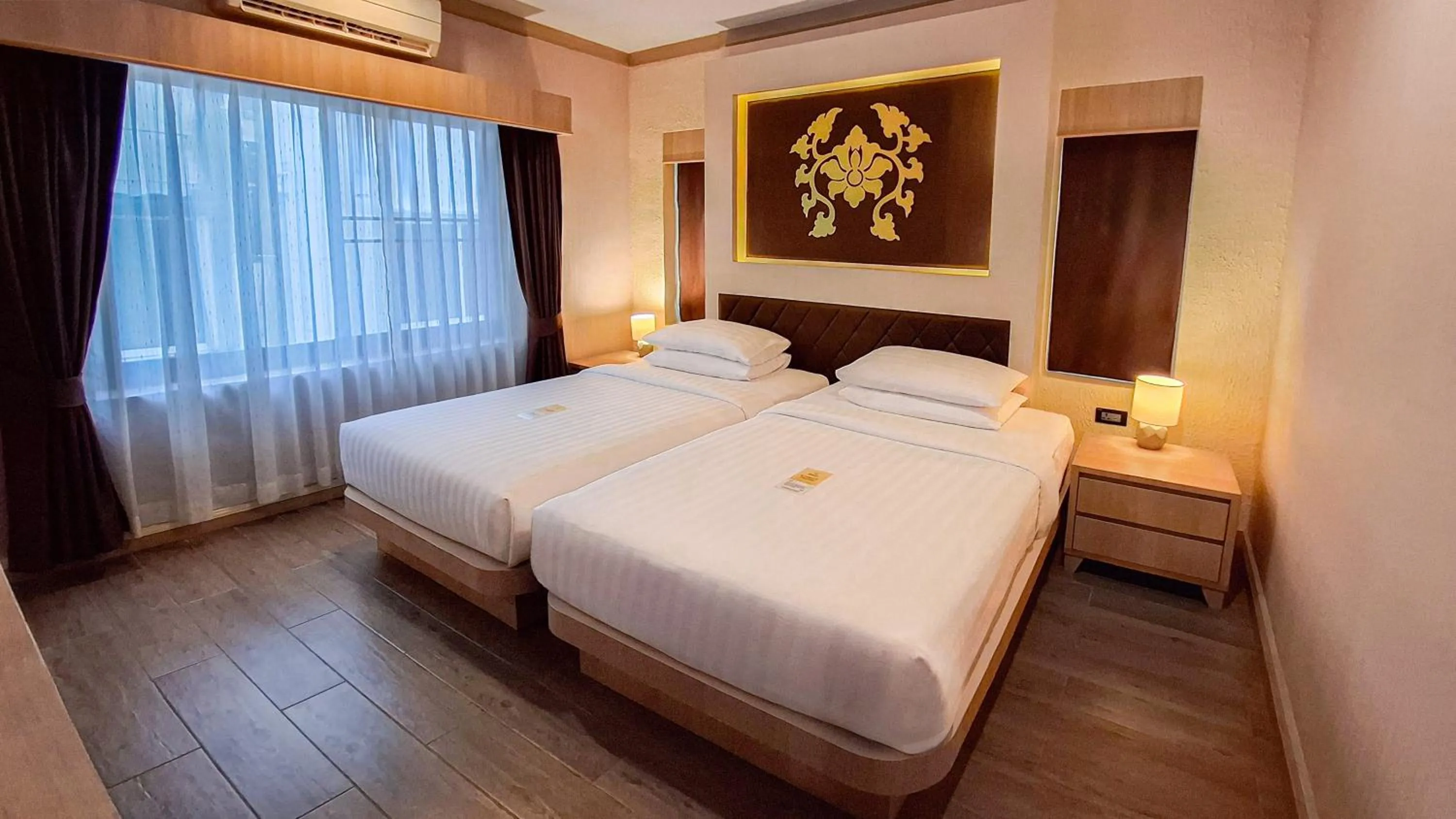 Bed in Quality Beach Resorts and Spa Patong