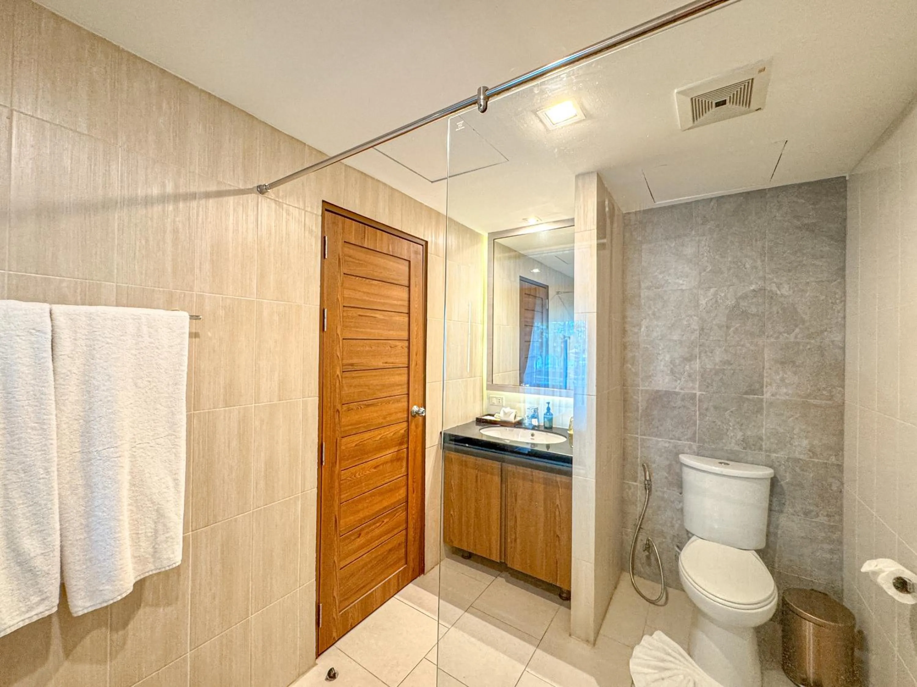 Toilet in Quality Beach Resorts and Spa Patong