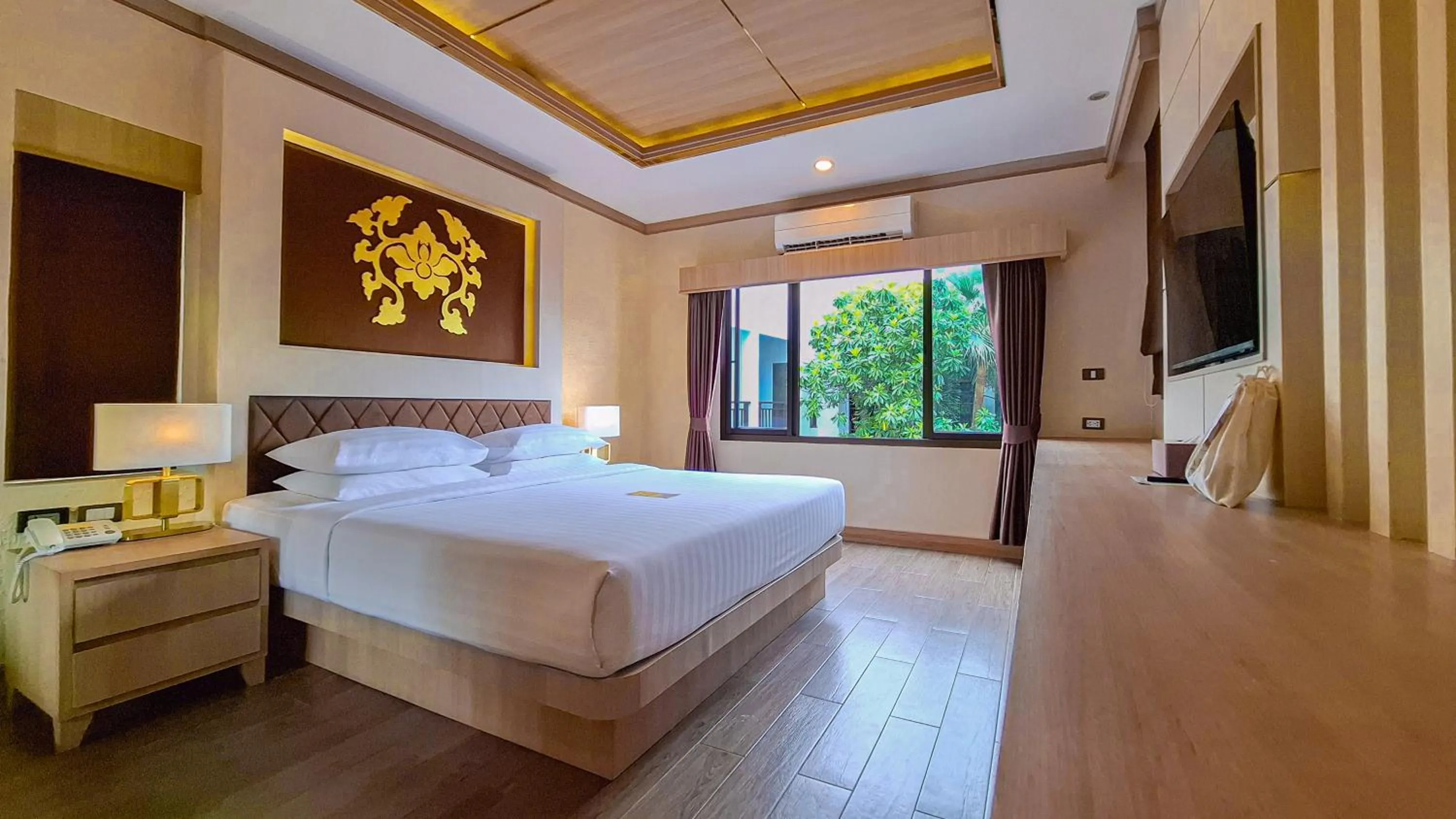 Bed in Quality Beach Resorts and Spa Patong