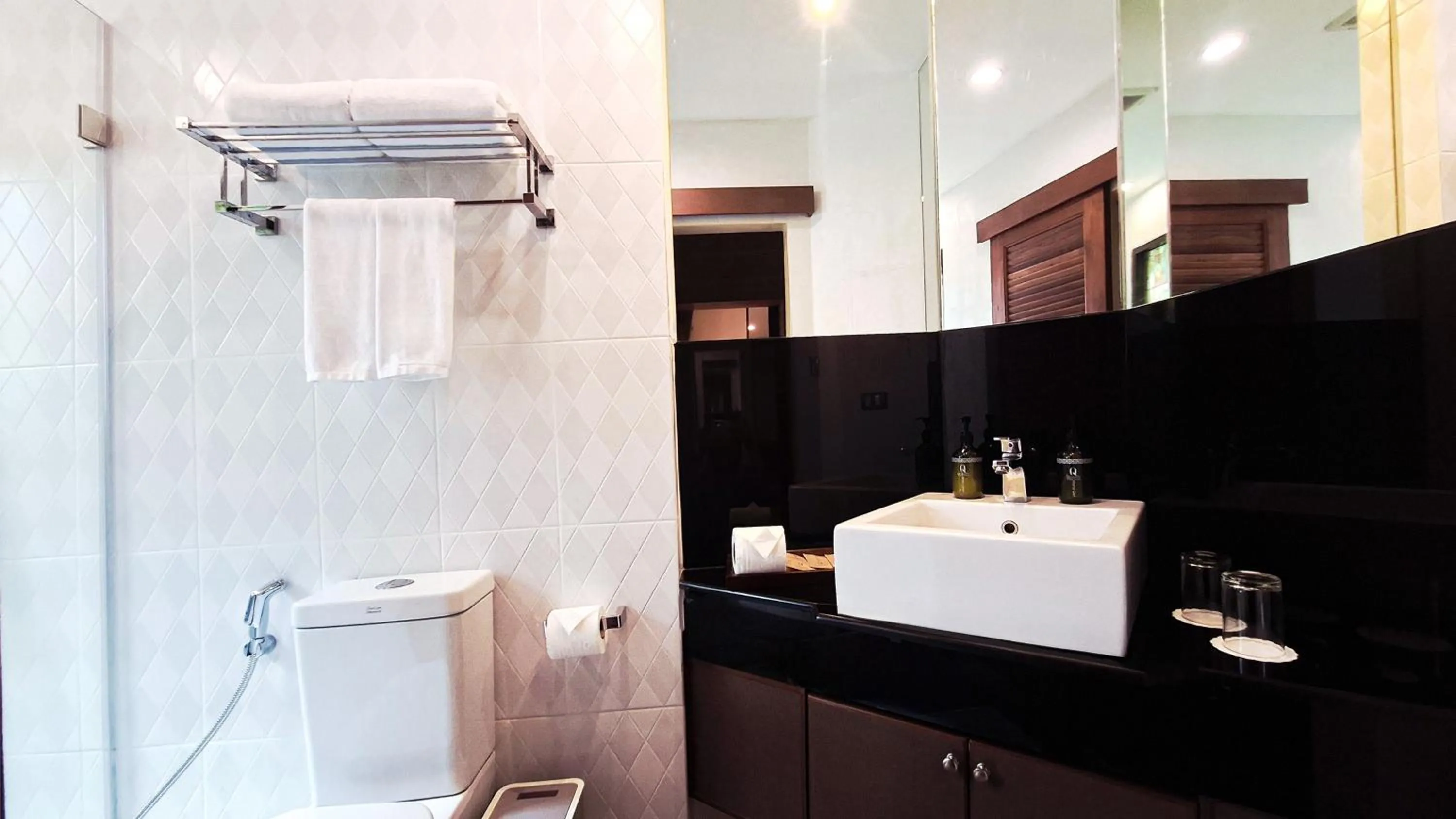 Toilet in Quality Beach Resorts and Spa Patong