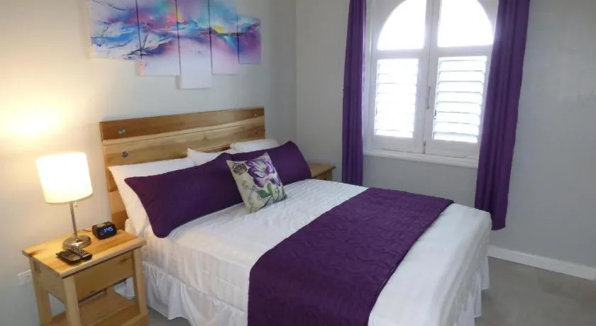 Bed in Sandcastles Beach Studios