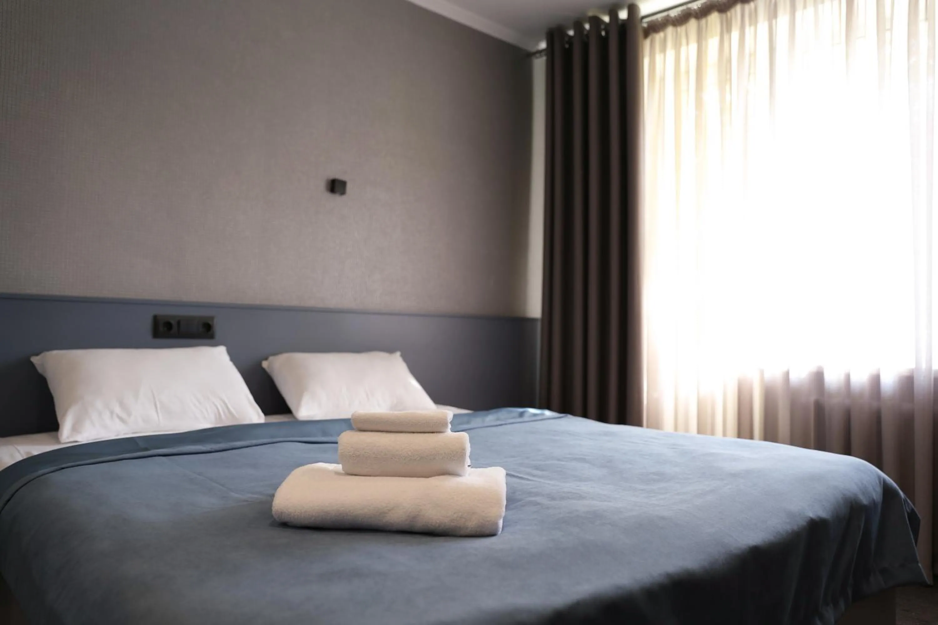 towels, Bed in Olympica Hotel