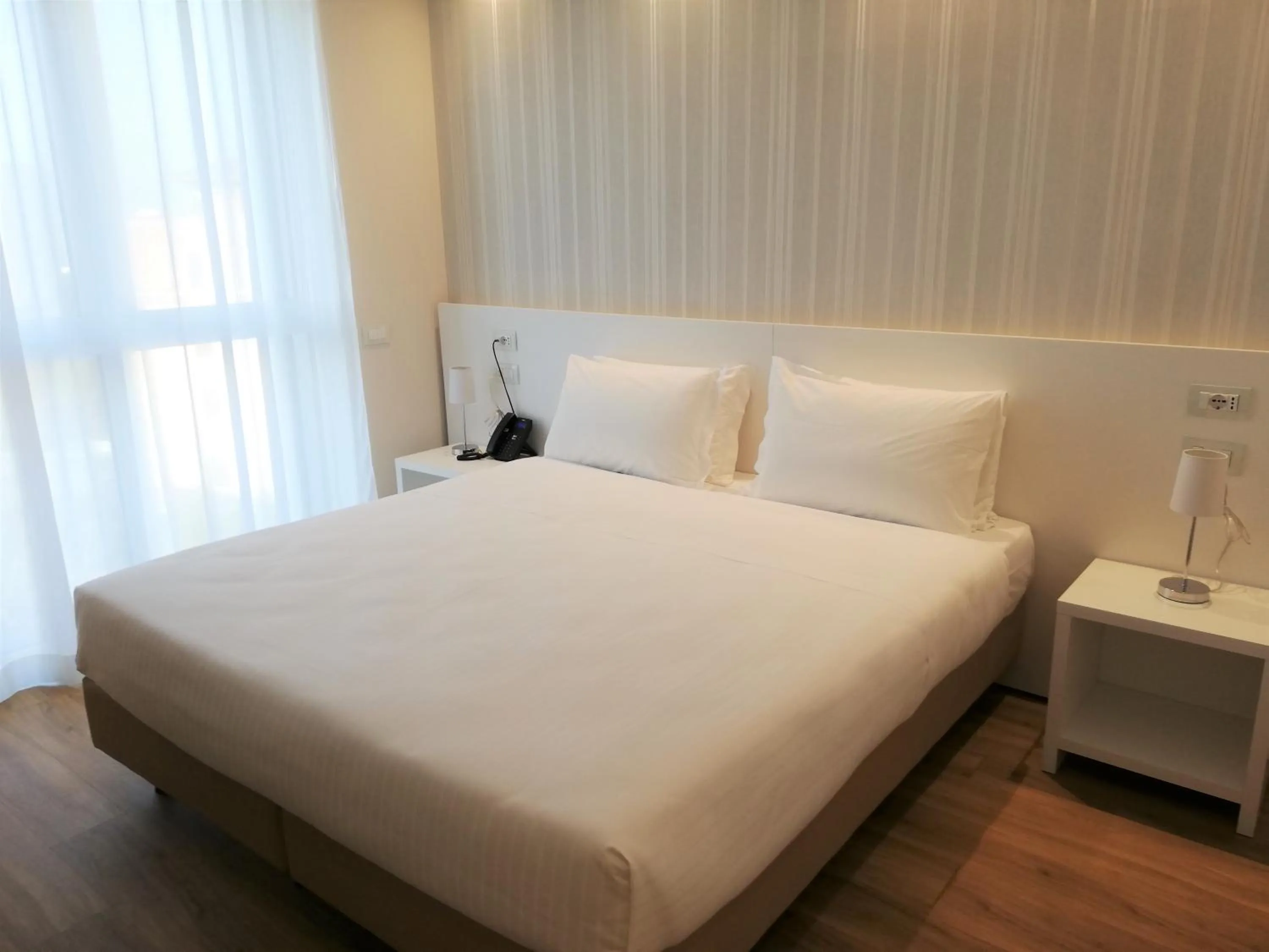 Bed in Novo Hotel Rossi