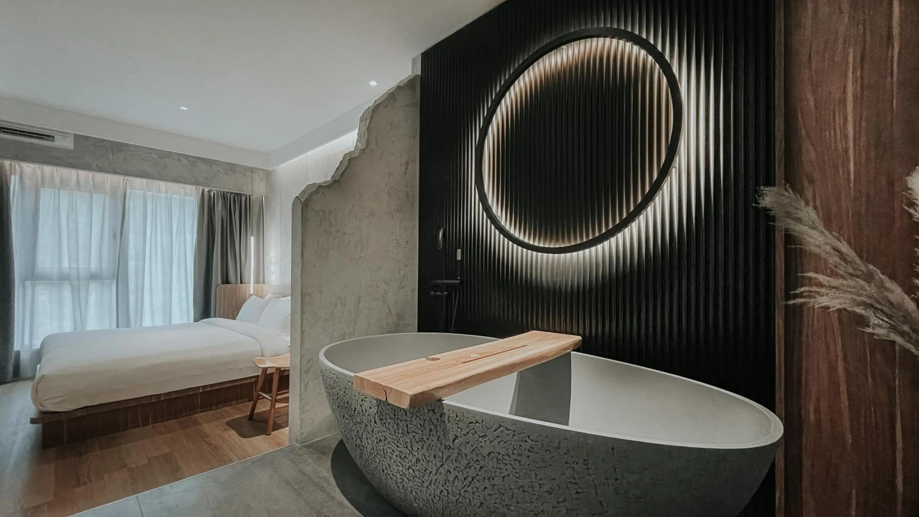 Bed in The Cara Boutique Hotel