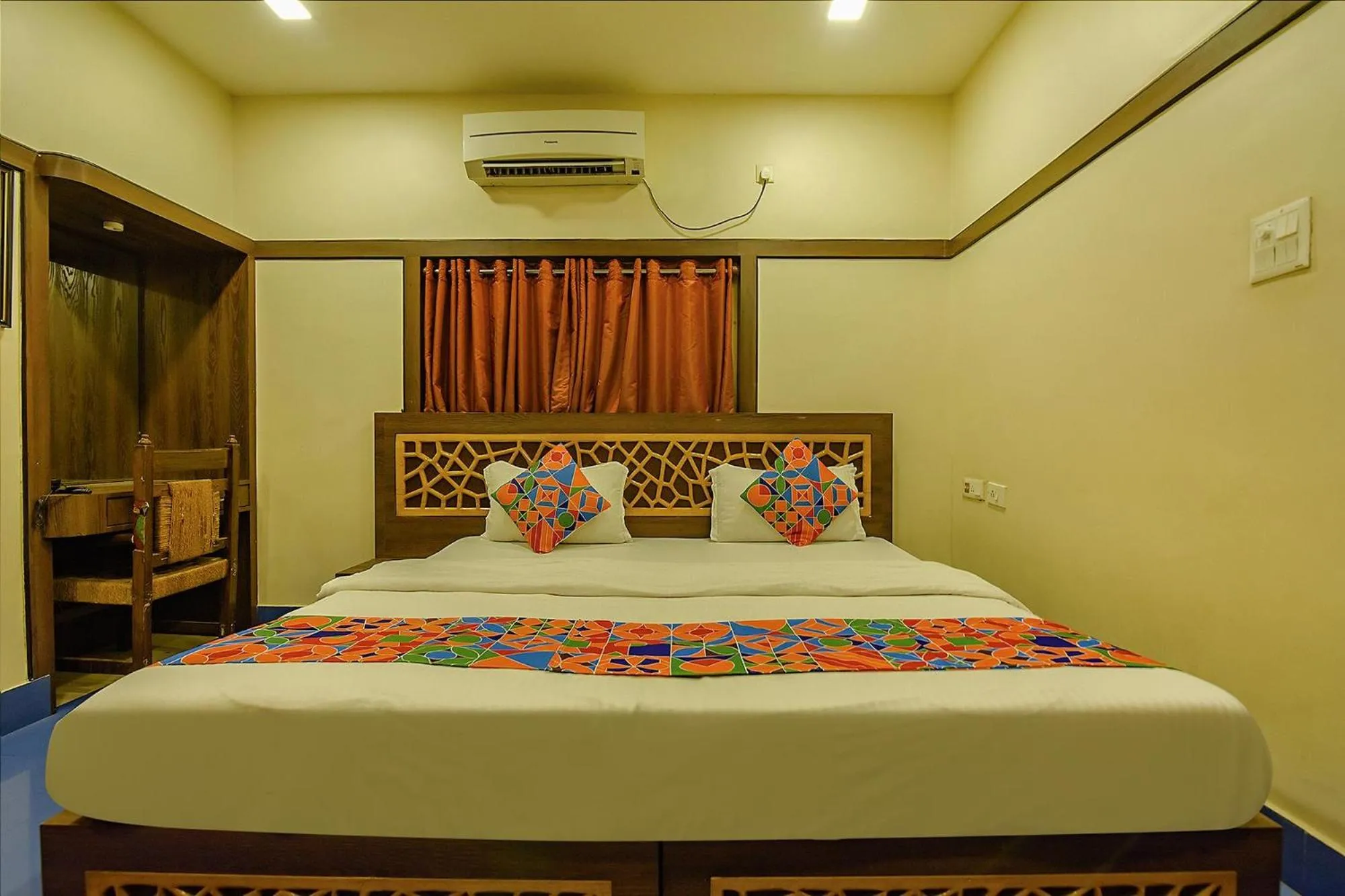 Bed in FabHotel Shivalya