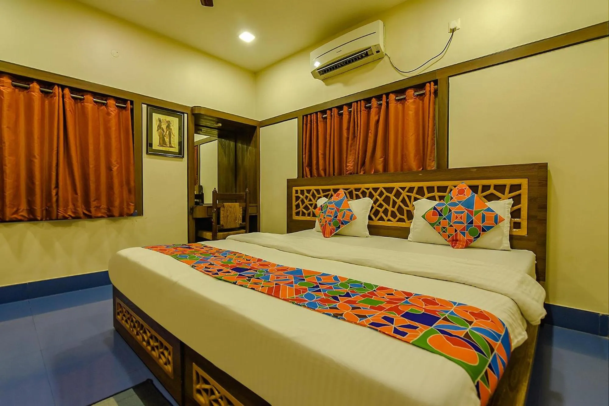 Bed in FabHotel Shivalya