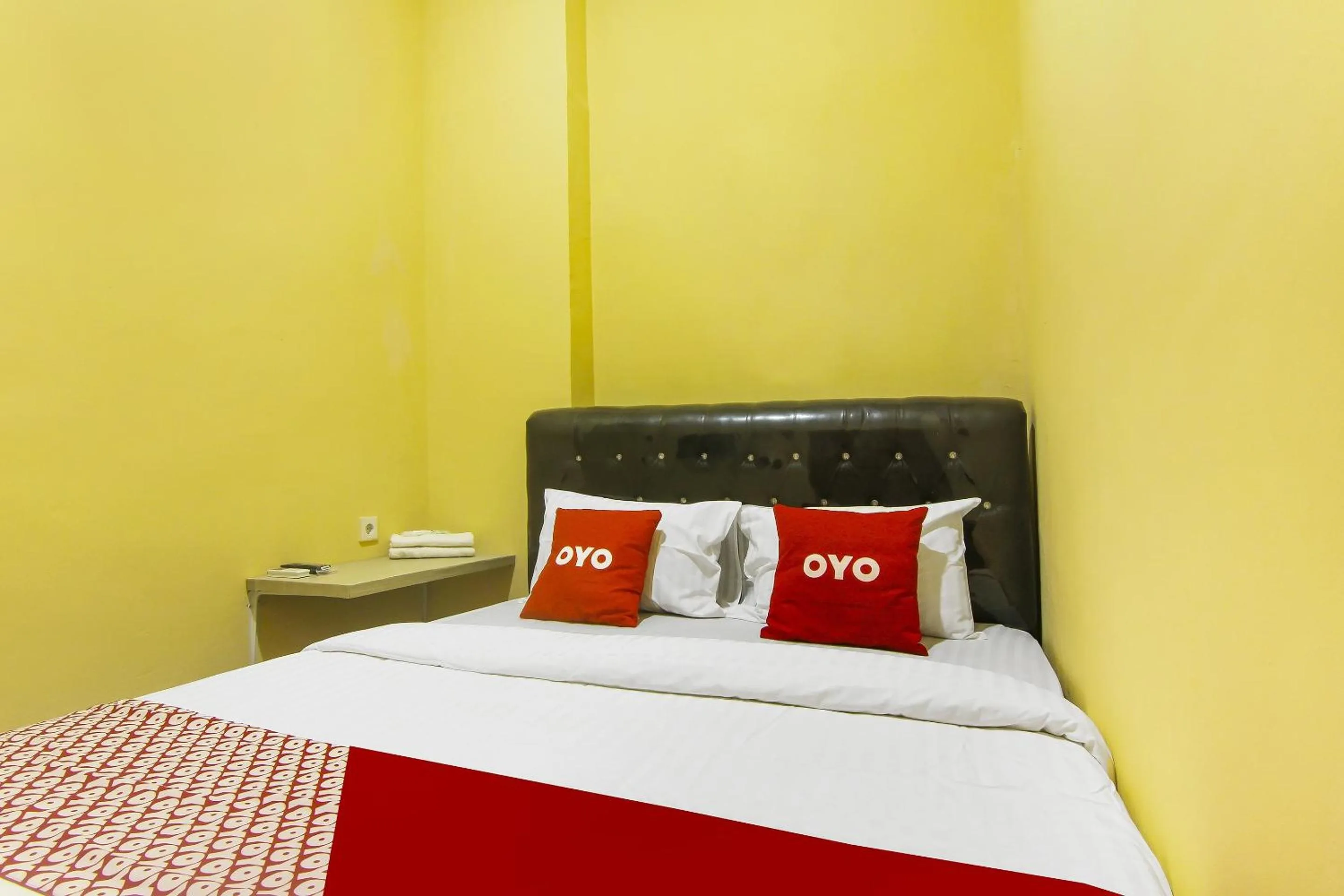 Bedroom in Hotel O Pagi Sore Residence