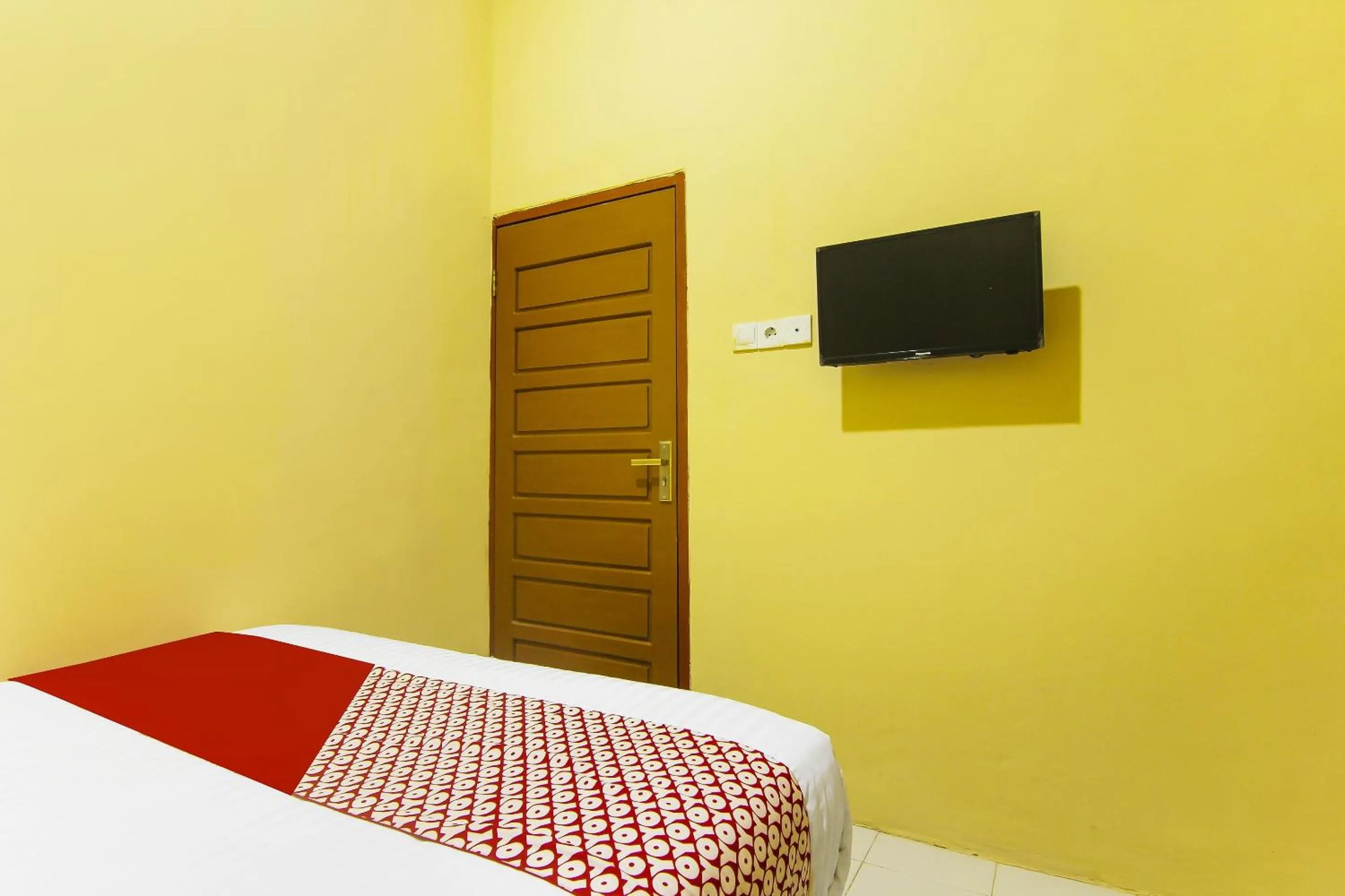 Bedroom in Hotel O Pagi Sore Residence