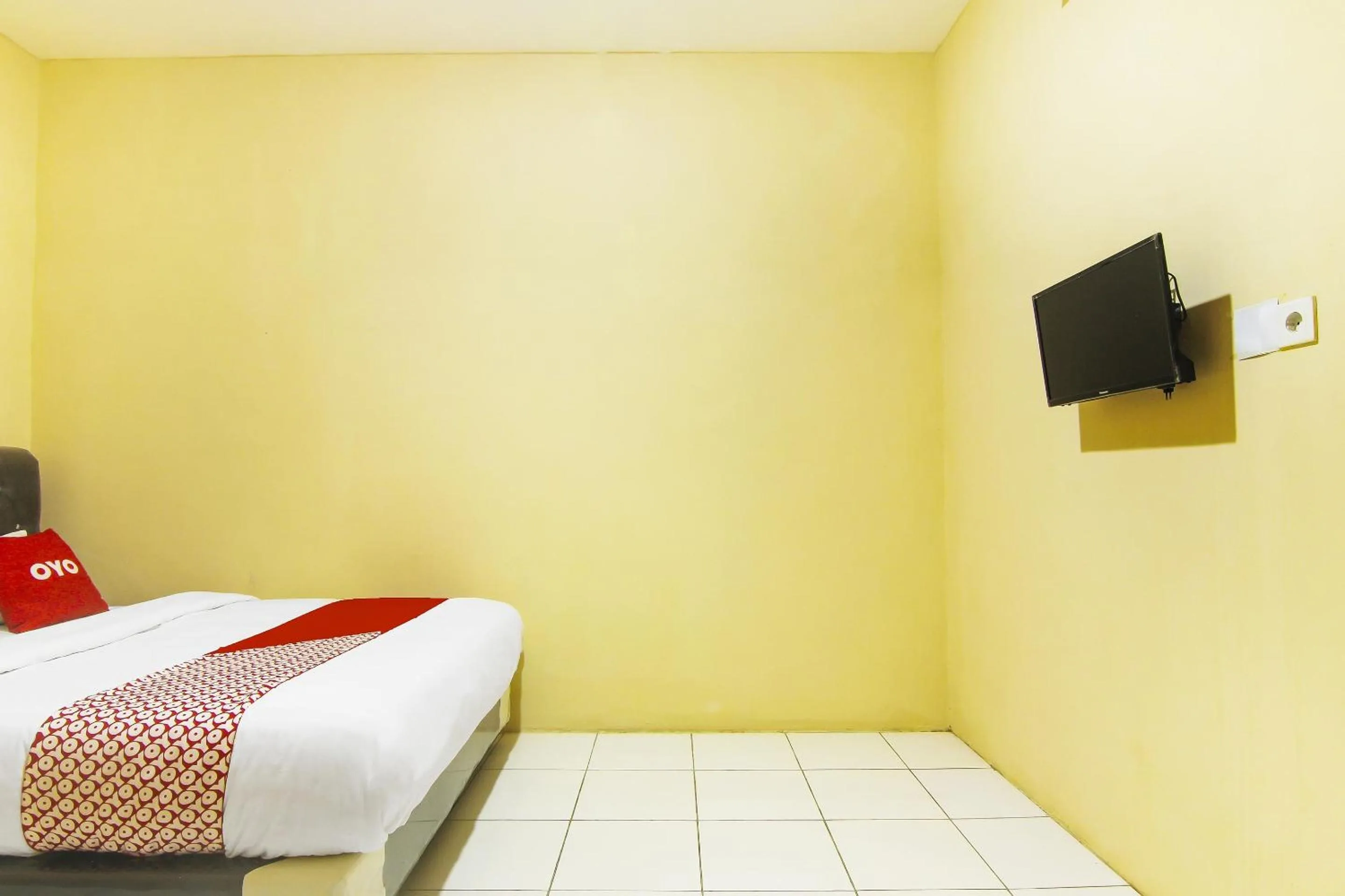 Bedroom in Hotel O Pagi Sore Residence