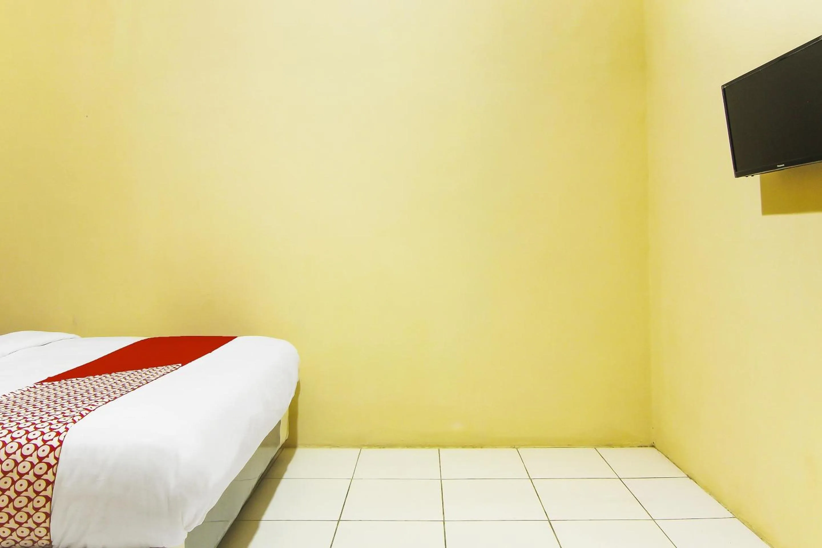 Bedroom in Hotel O Pagi Sore Residence