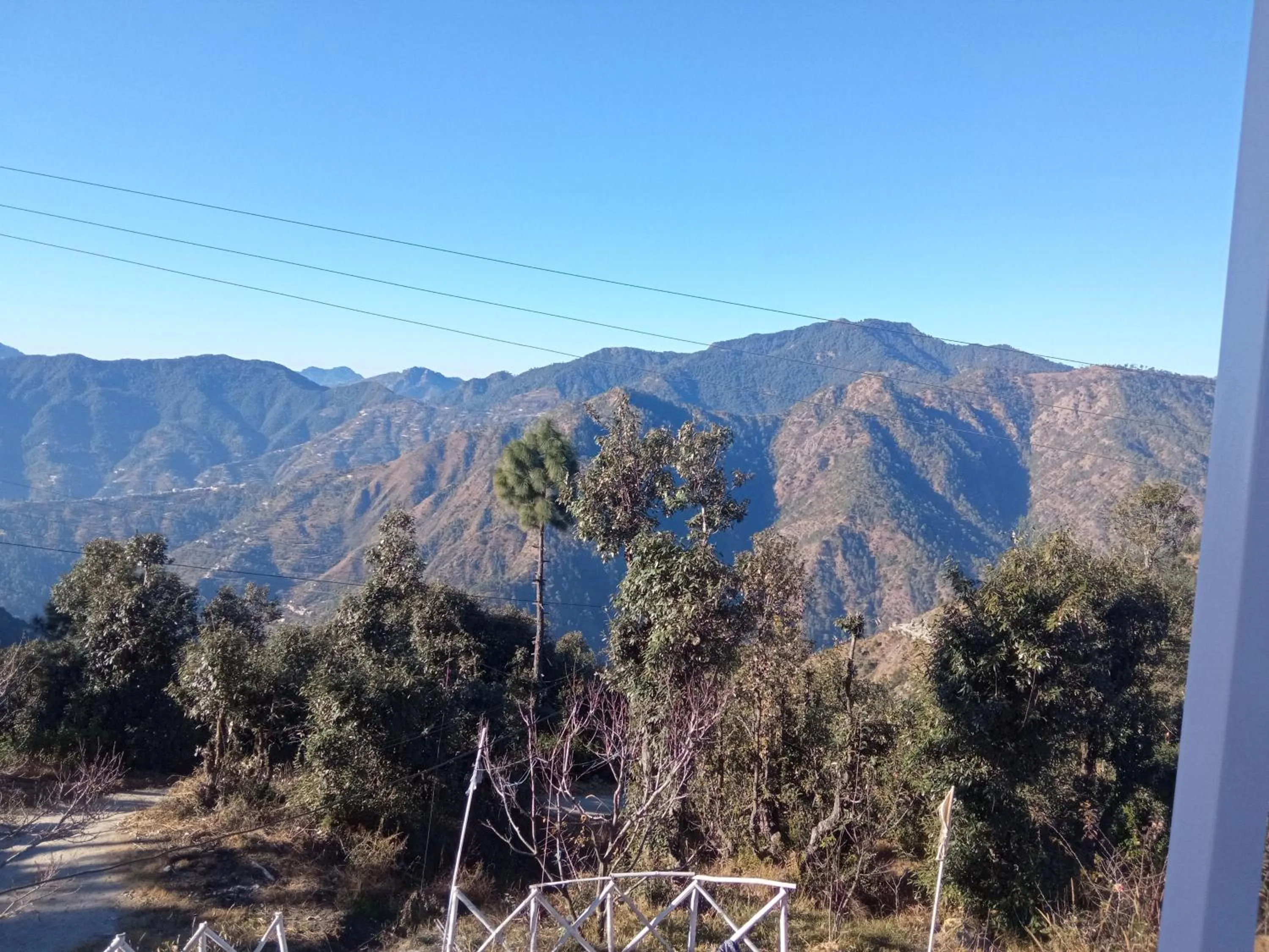 Mountain view in IN APPLE ESTATE KANATAL - Himalayan View Resort with Courteous Staff